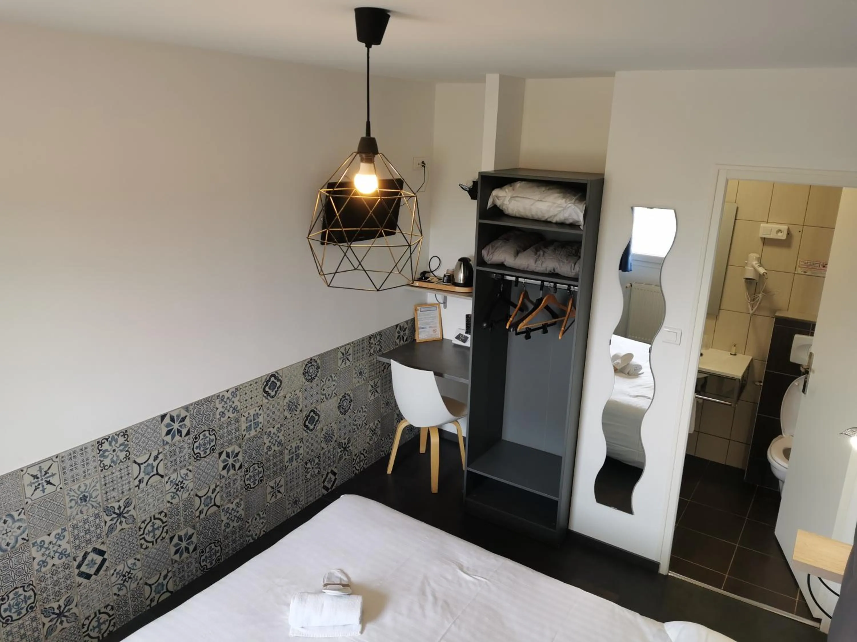 Bed in Logis Hotel- Restaurant La Haie Des Vignes Séminaires et Evènementiel