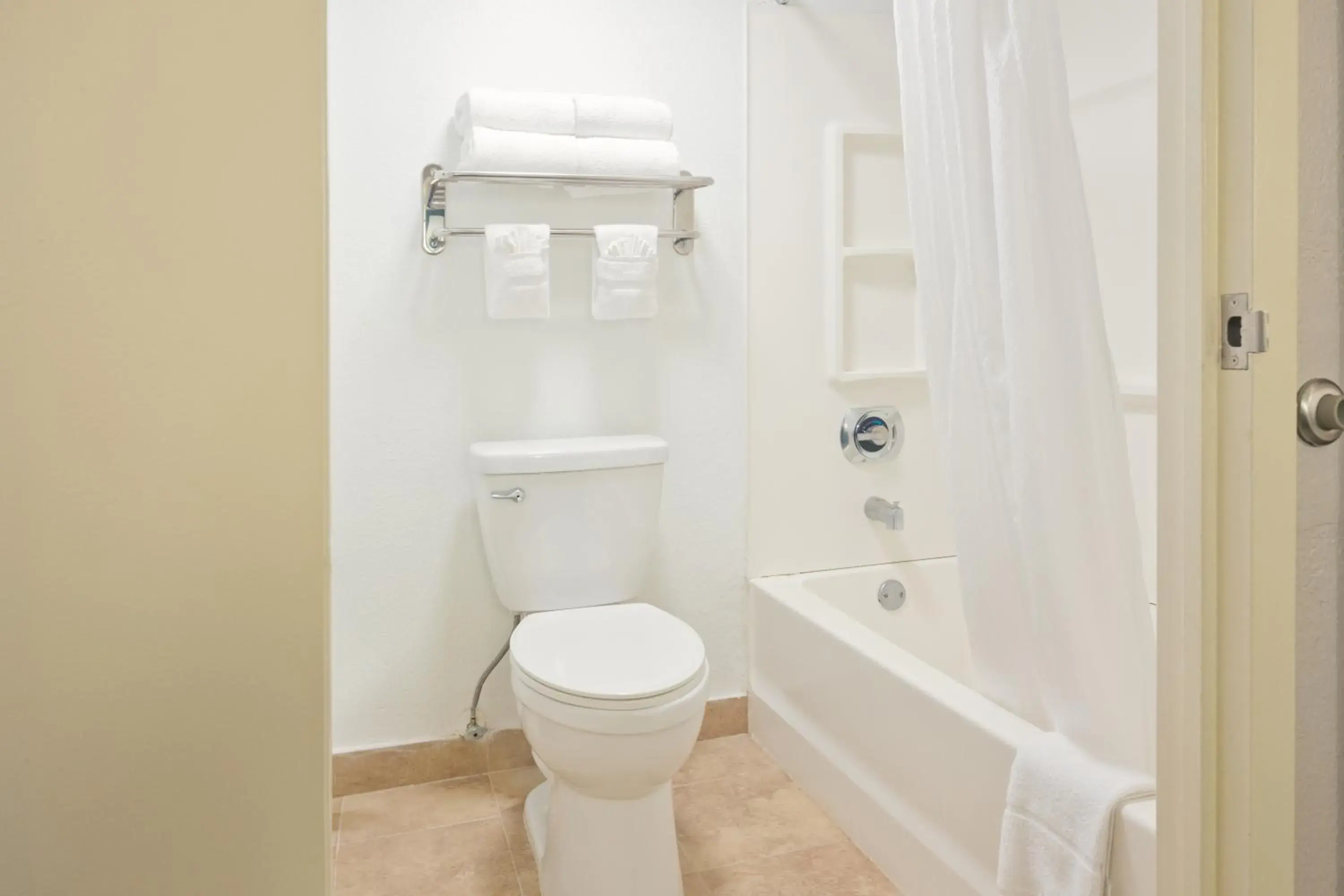 Bathroom in The Palms Inn & Suites Miami, Kendall, FL Bathroom in The Palms Inn & Suites Miami, Kendall, FL