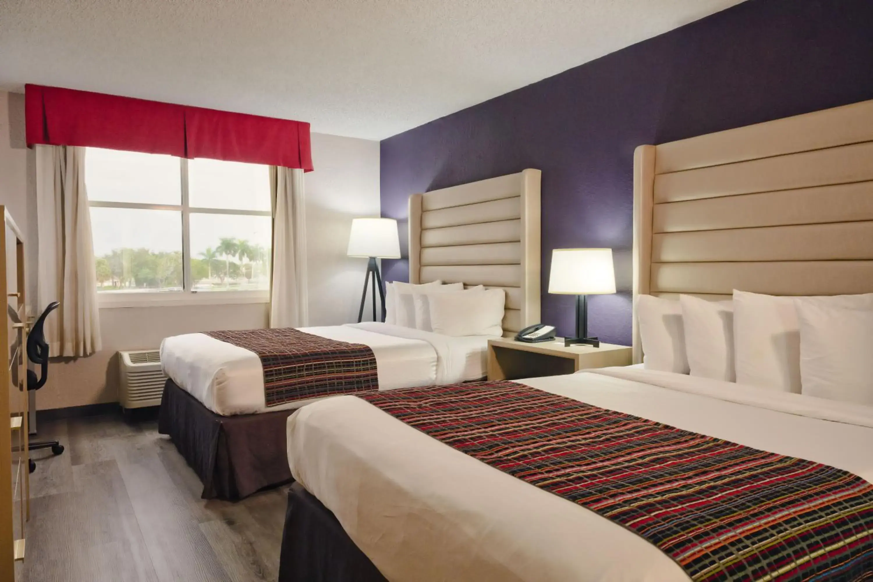 Queen Room with Two Queen Beds and Lake View - Non-Smoking in The Palms Inn & Suites Miami, Kendall, FL Queen Room with Two Queen Beds and Lake View - Non-Smoking in The Palms Inn & Suites Miami, Kendall, FL