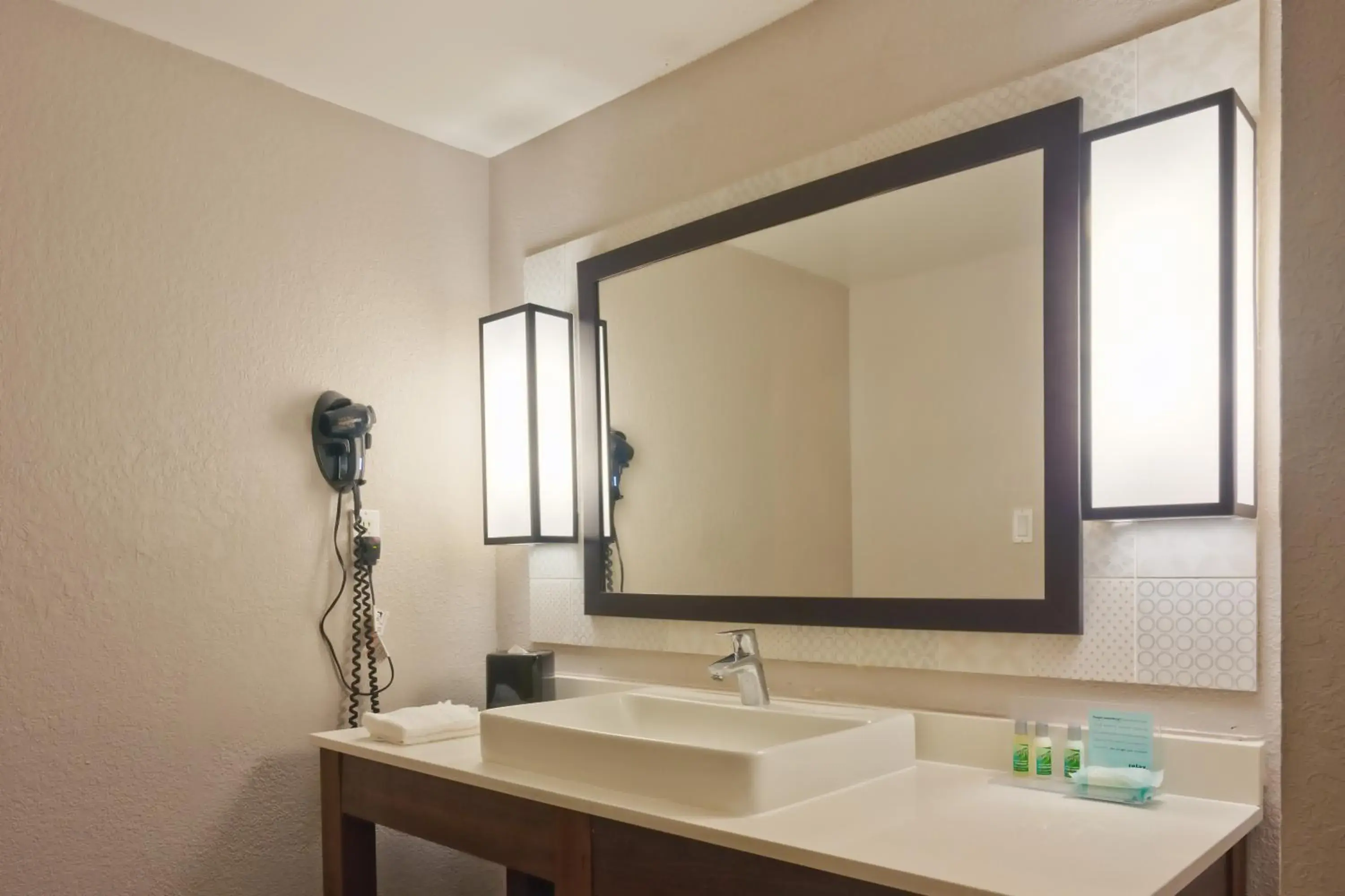 Bathroom in The Palms Inn & Suites Miami, Kendall, FL Bathroom in The Palms Inn & Suites Miami, Kendall, FL