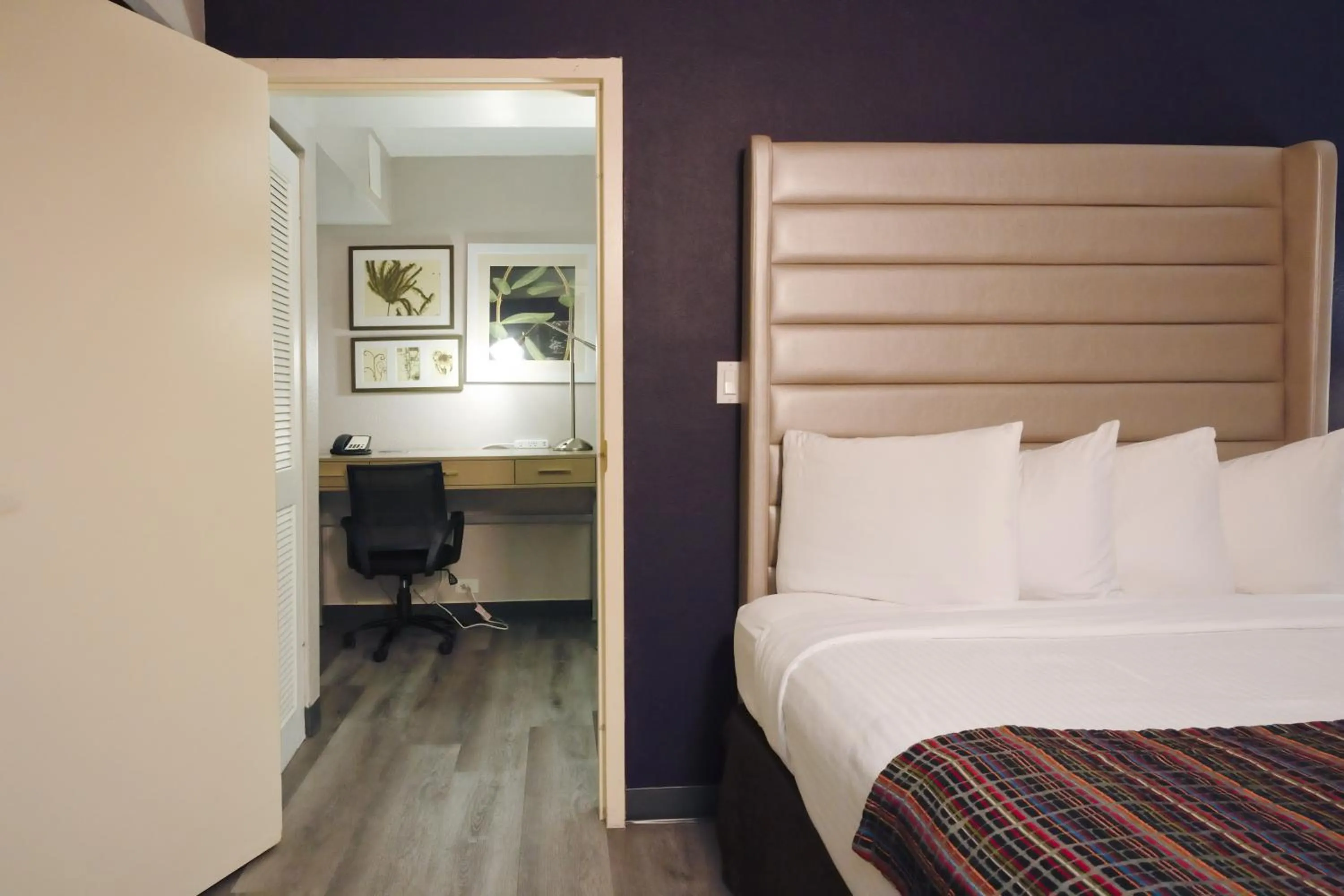 Bedroom, Bed in The Palms Inn & Suites Miami, Kendall, FL