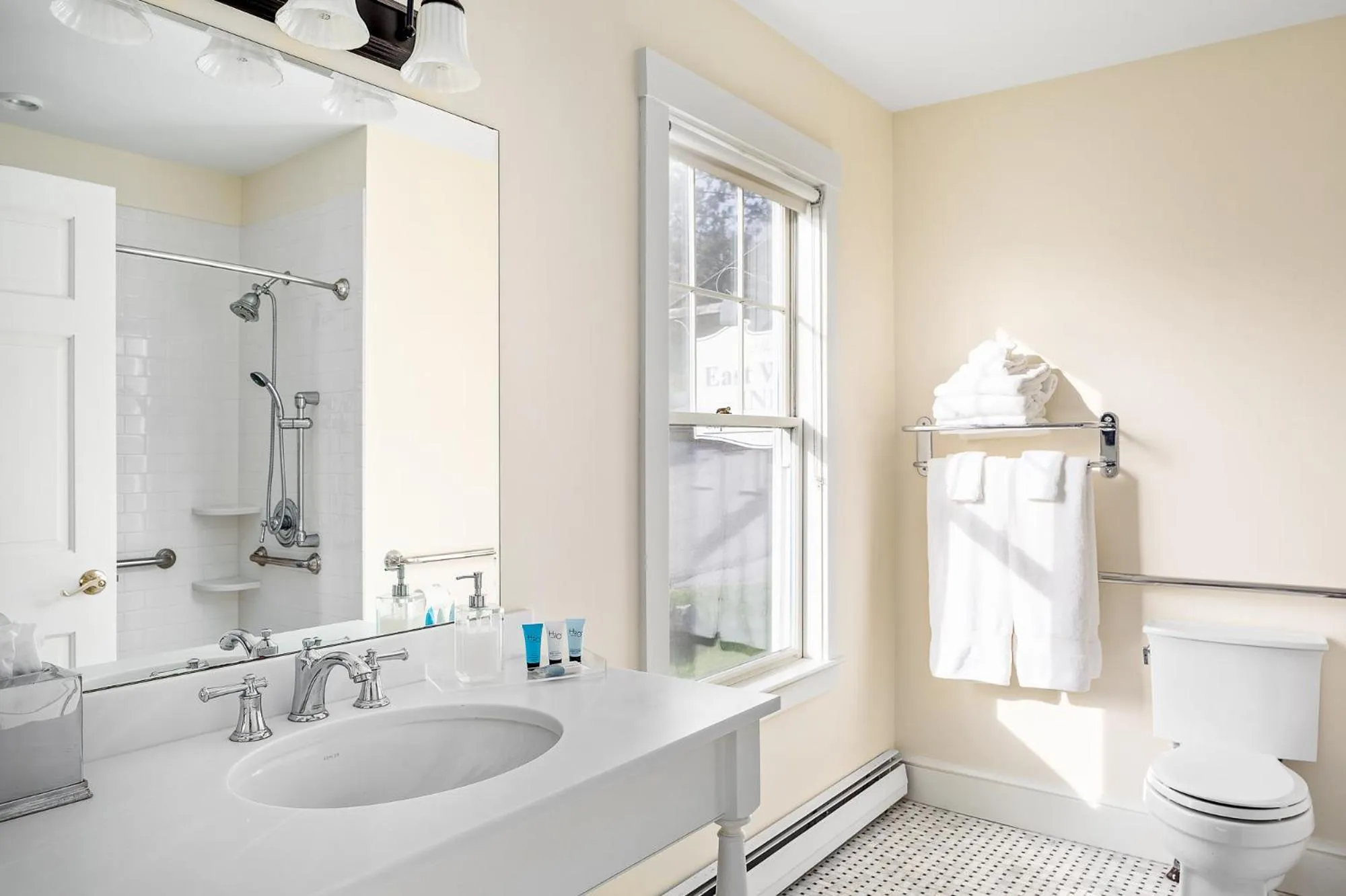 Bathroom in East Wind Inn & Suites