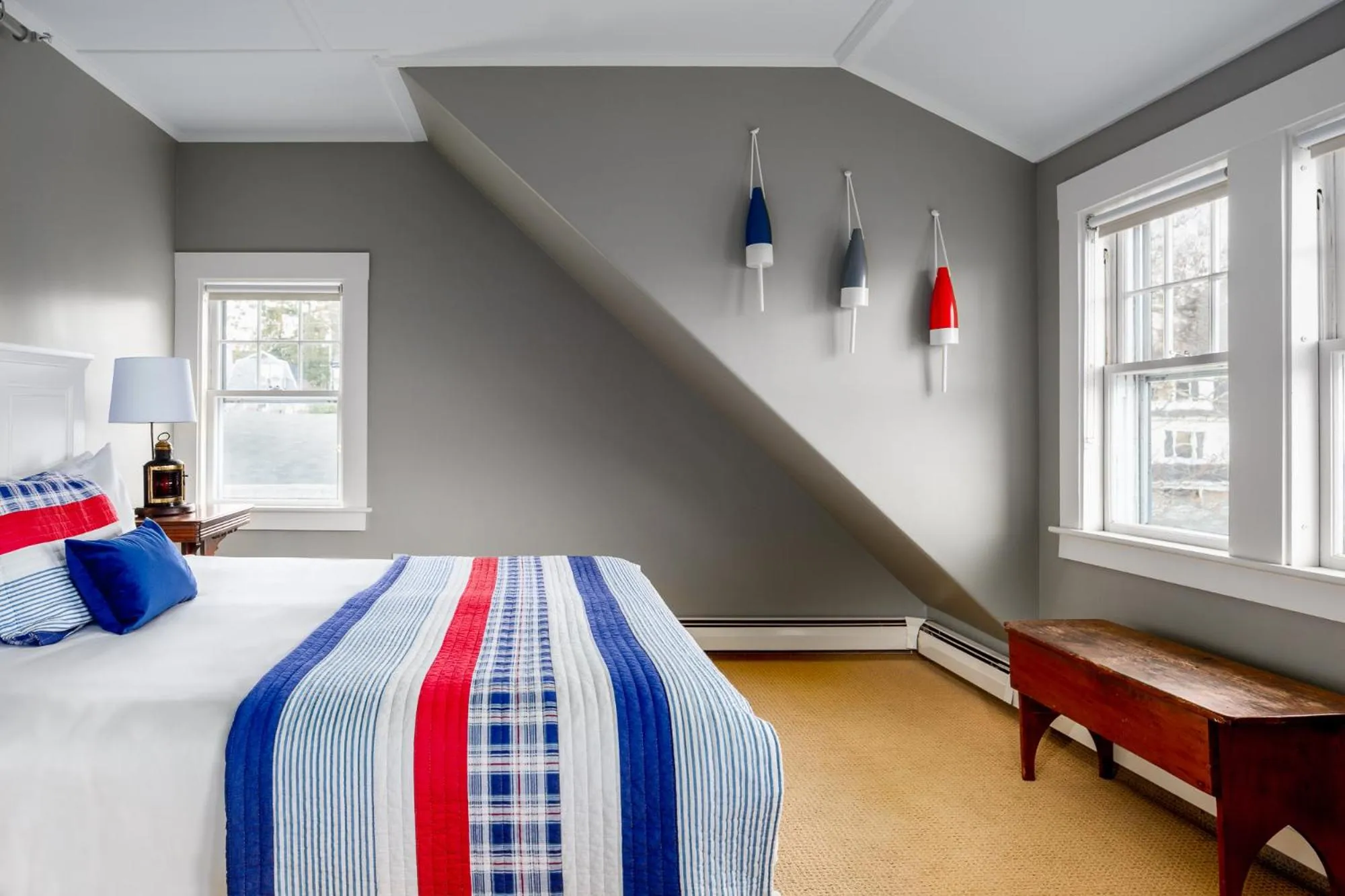 Bed in East Wind Inn & Suites