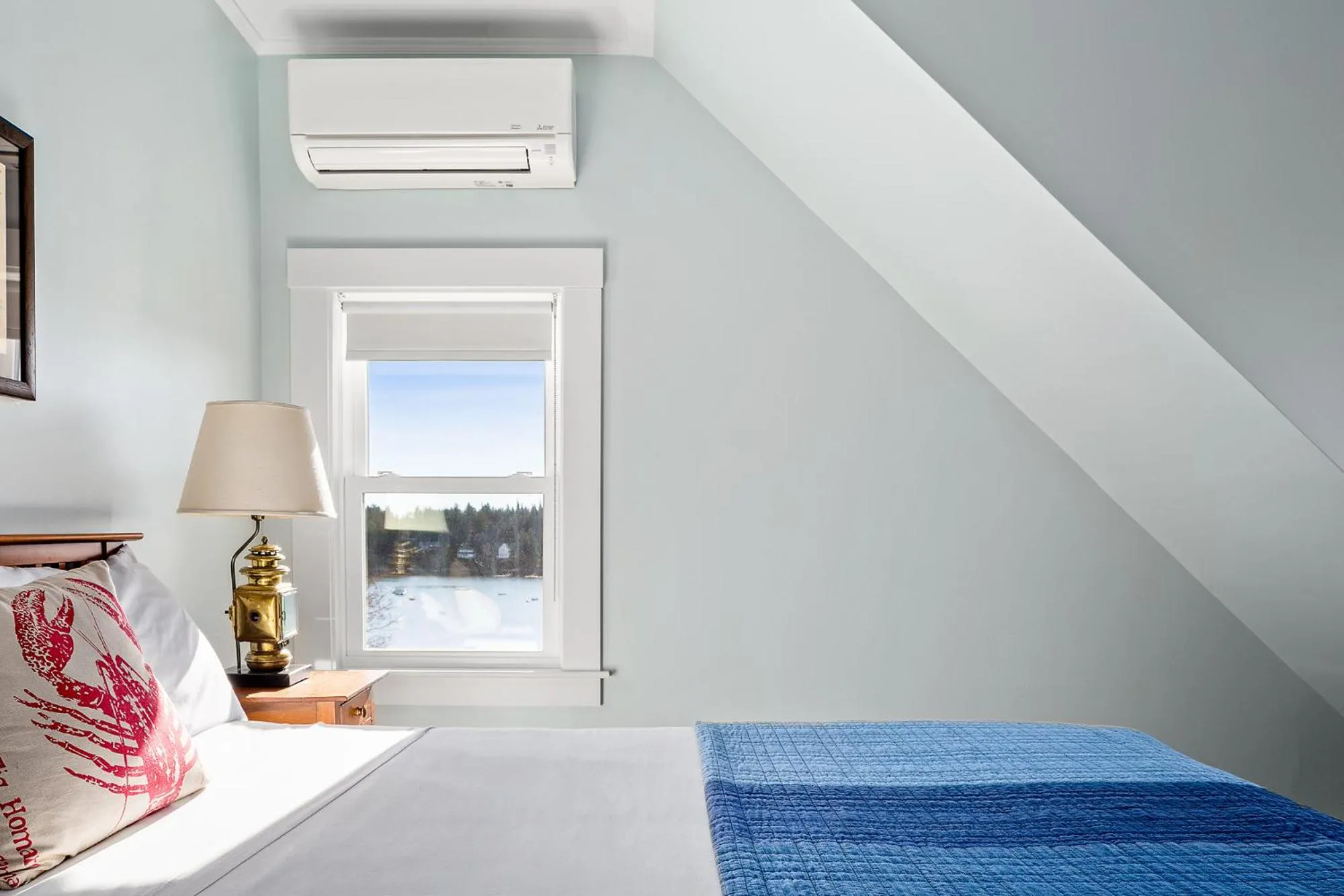 Bedroom in East Wind Inn & Suites