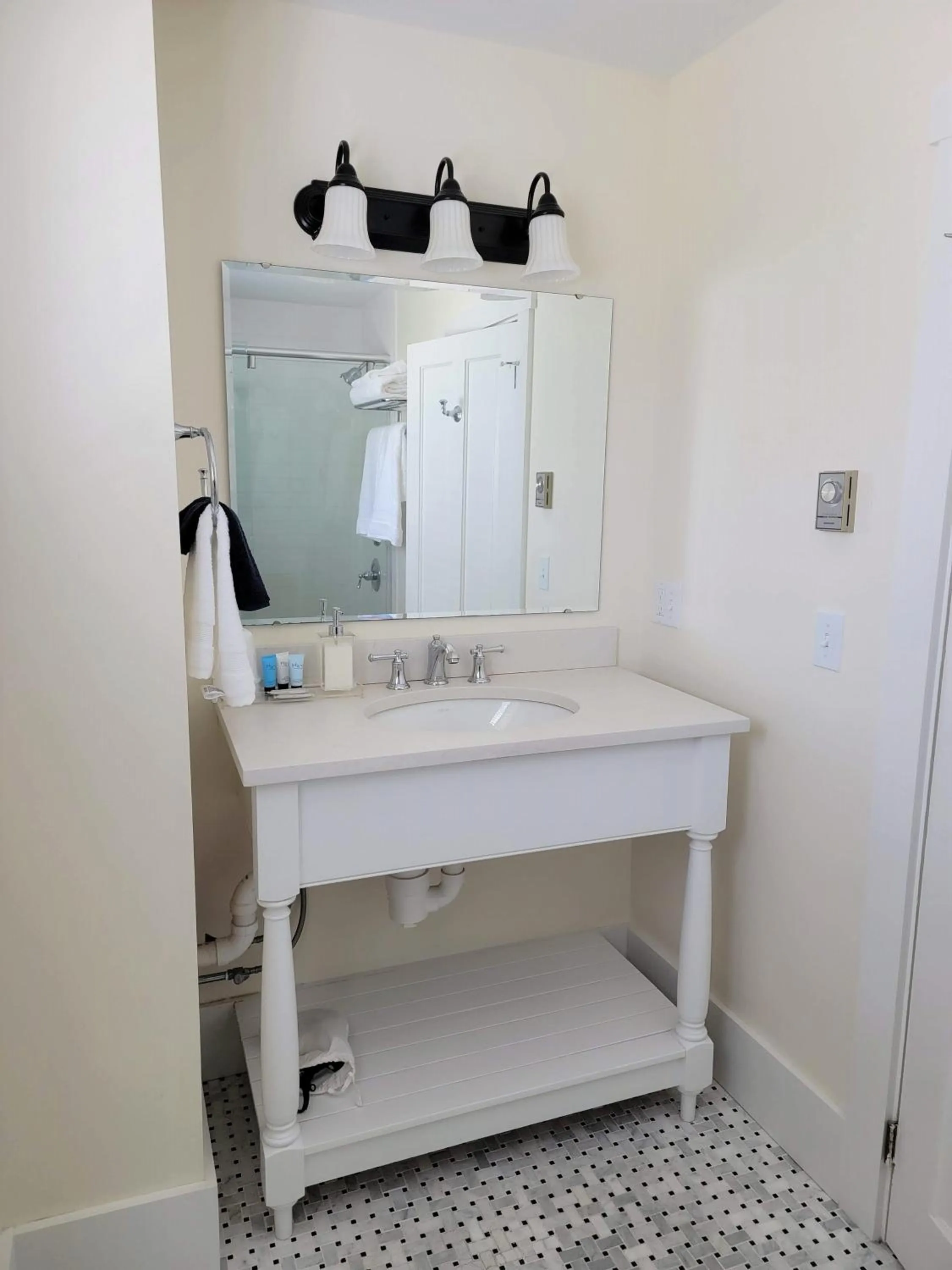 Bathroom in East Wind Inn & Suites