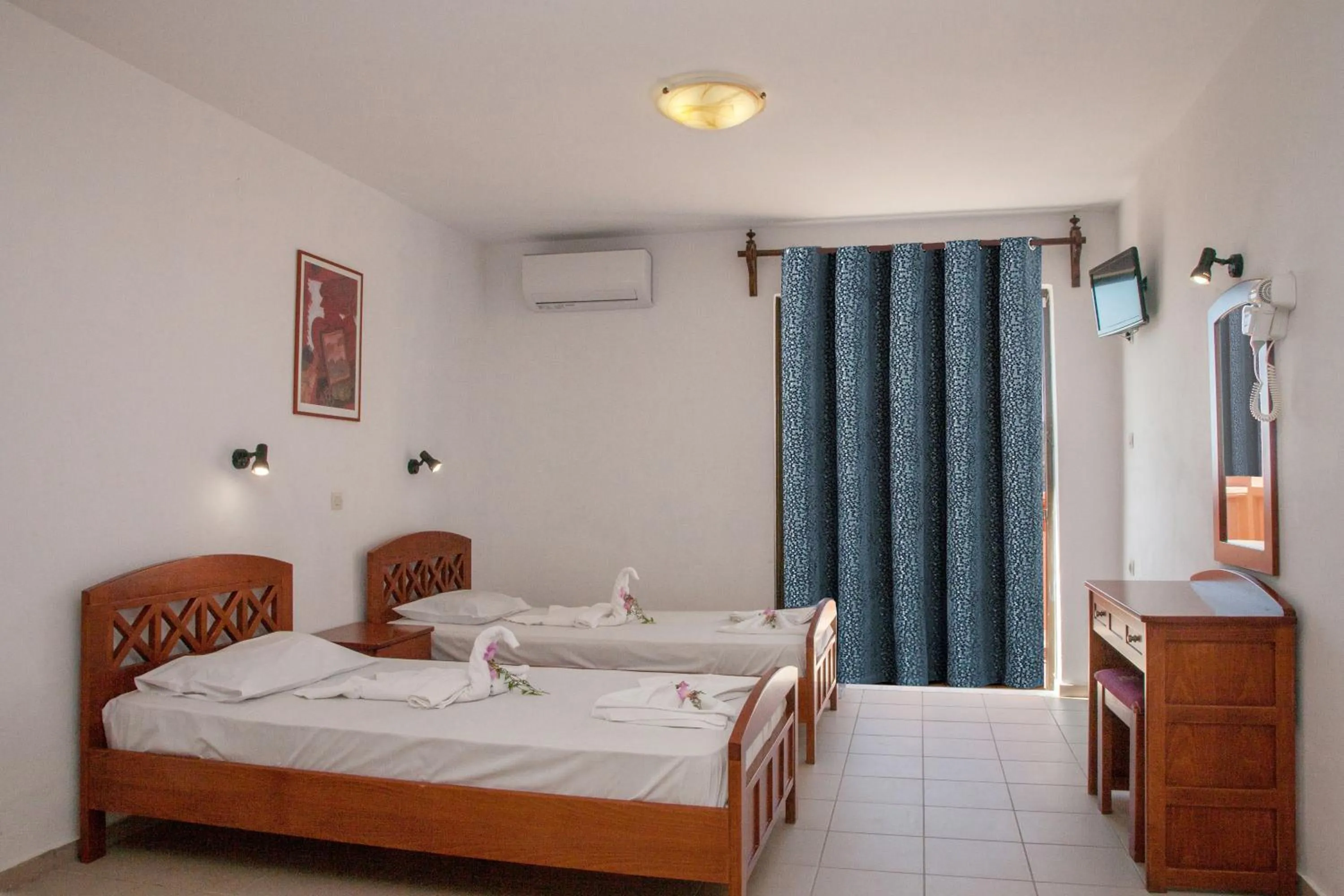 Bed in Ekavi Apartments