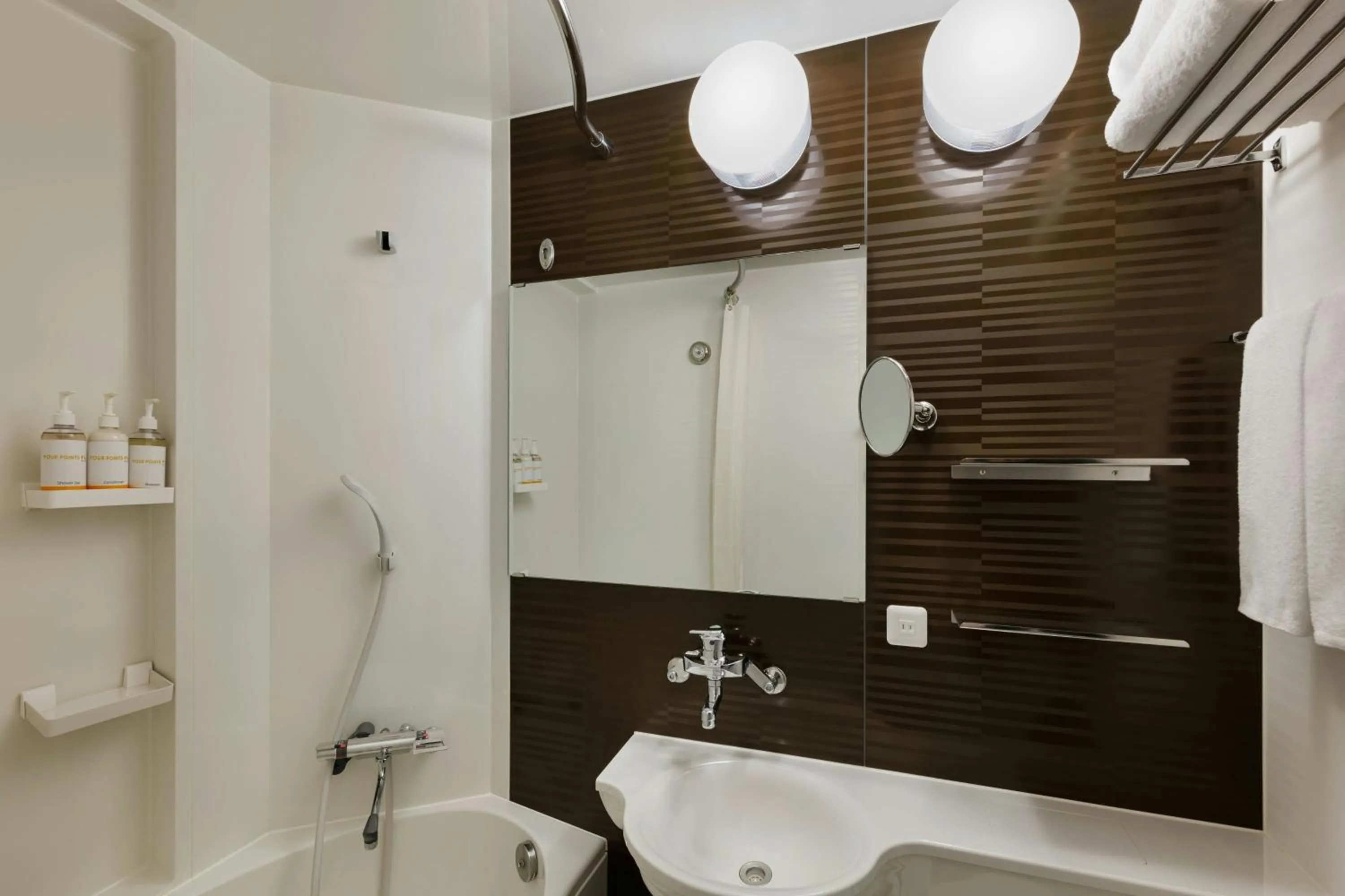 Bathroom in Four Points Flex by Sheraton Shin Osaka