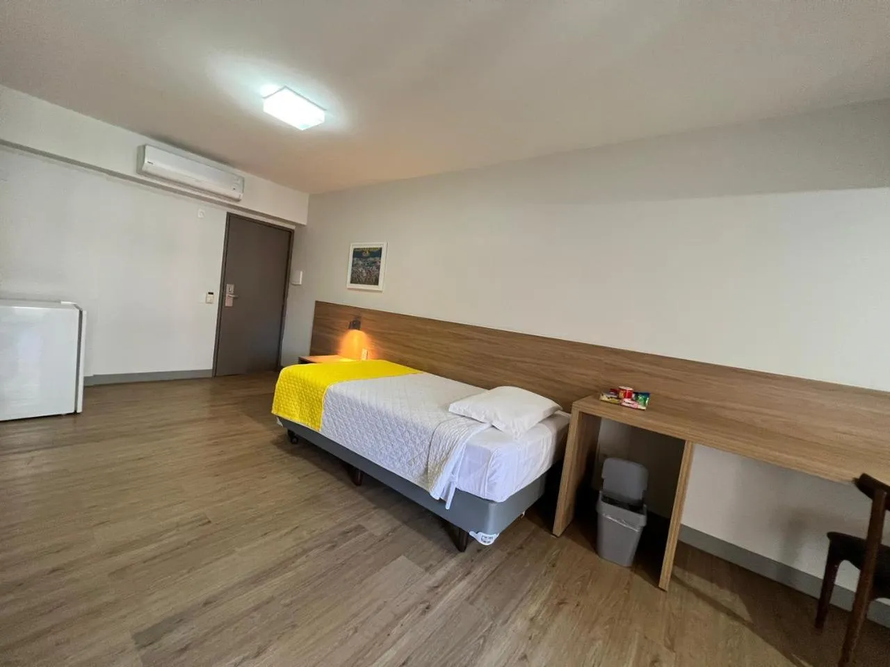 Bed in San Marino Suite Hotel