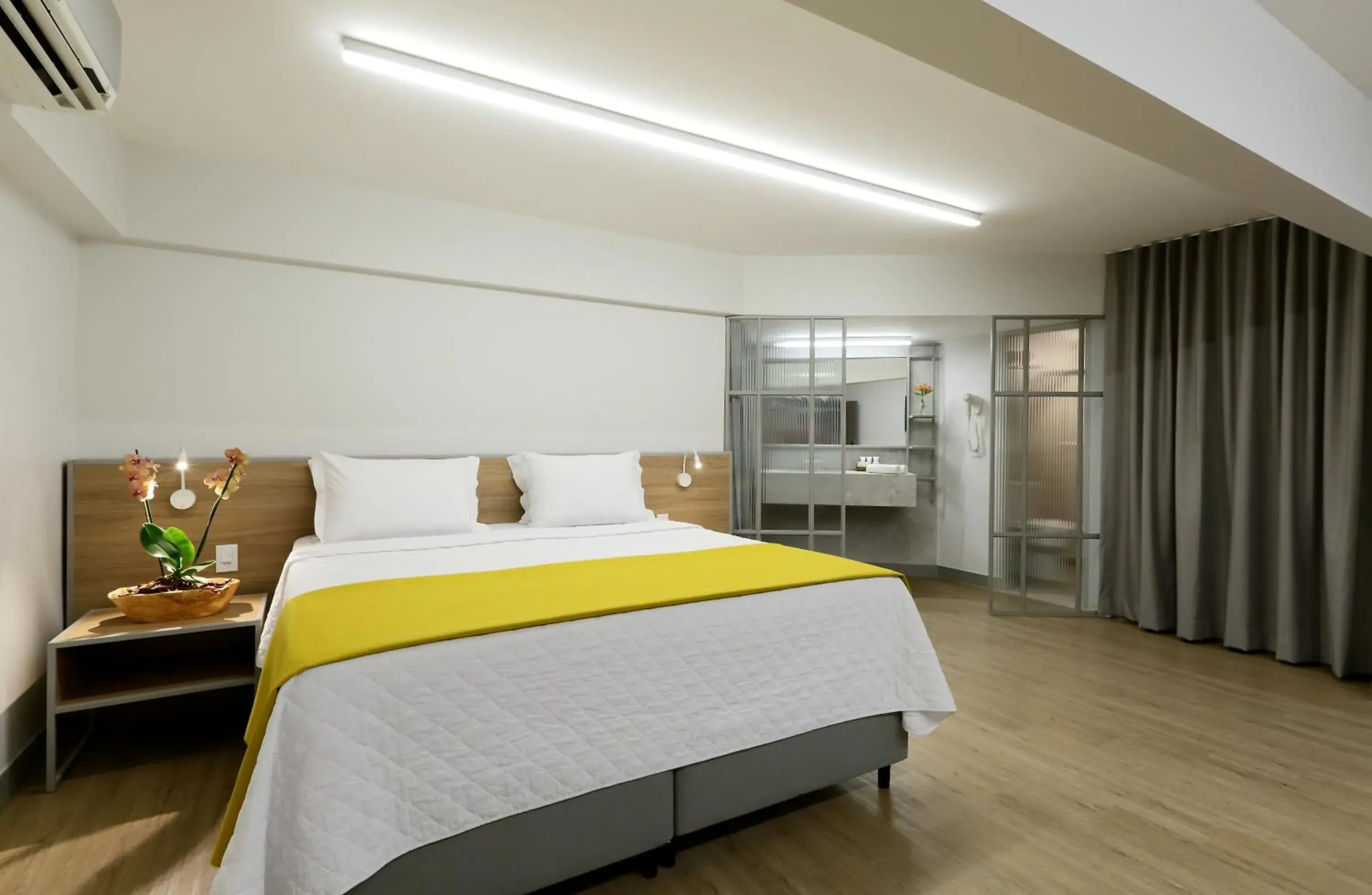 Bed in San Marino Suite Hotel Bed in San Marino Suite Hotel