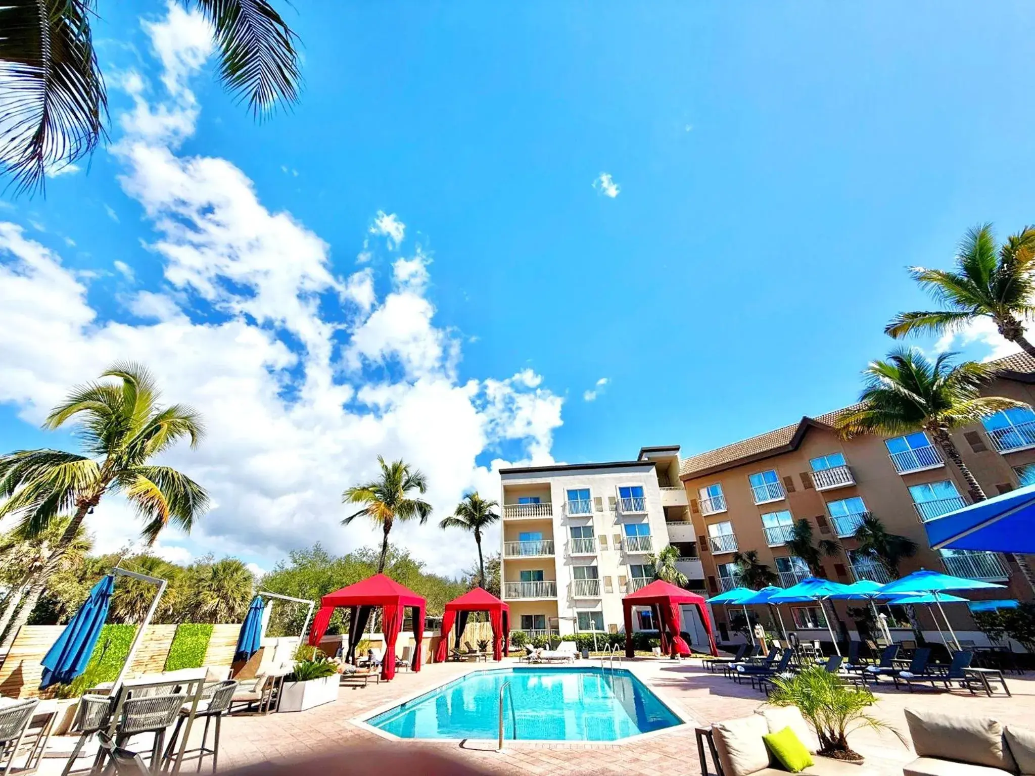 Pool view in Holiday Inn Express & Suites Naples Downtown - 5th Avenue by IHG Pool view in Holiday Inn Express & Suites Naples Downtown - 5th Avenue by IHG
