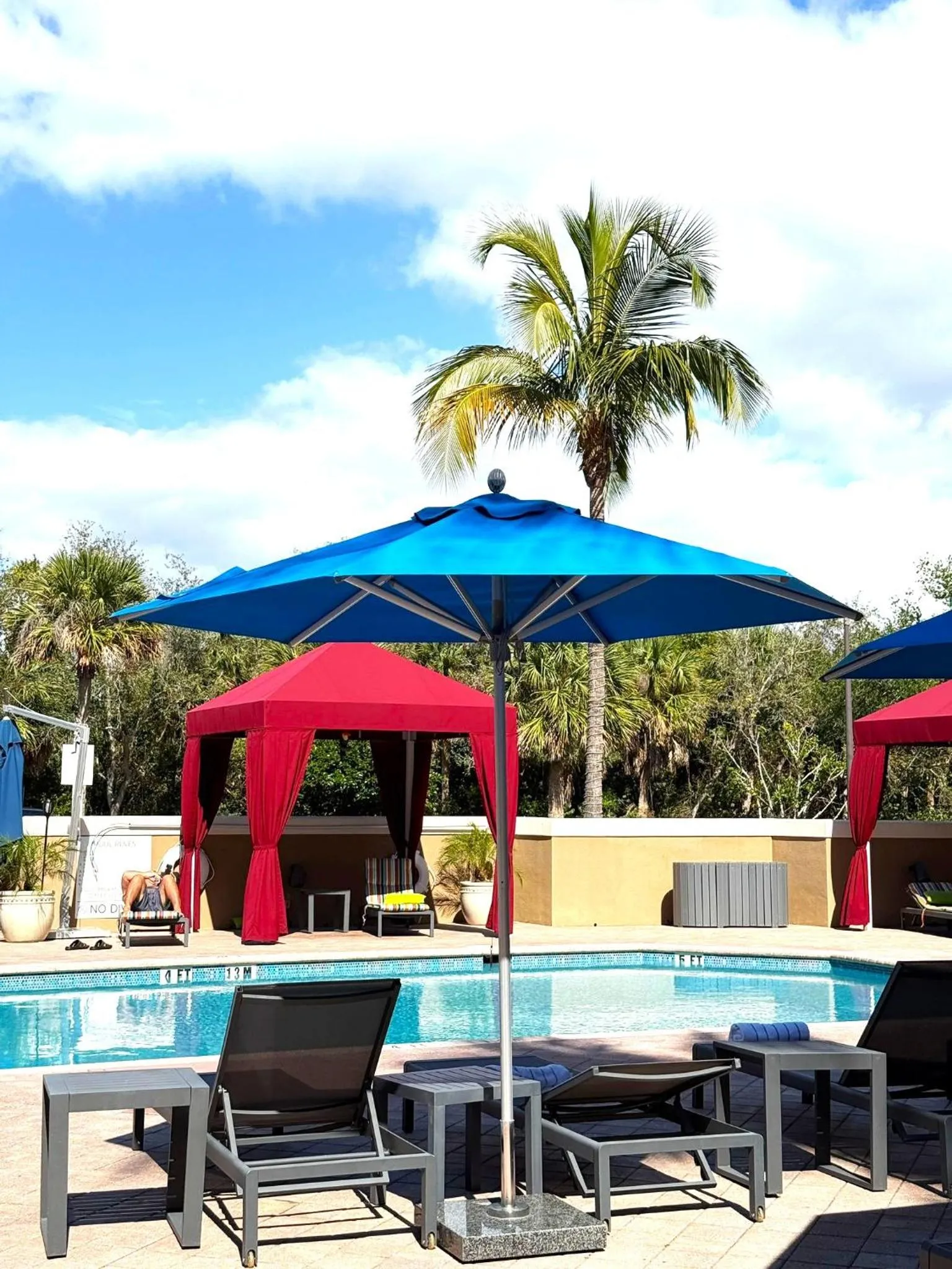 Swimming pool in Holiday Inn Express & Suites Naples Downtown - 5th Avenue by IHG