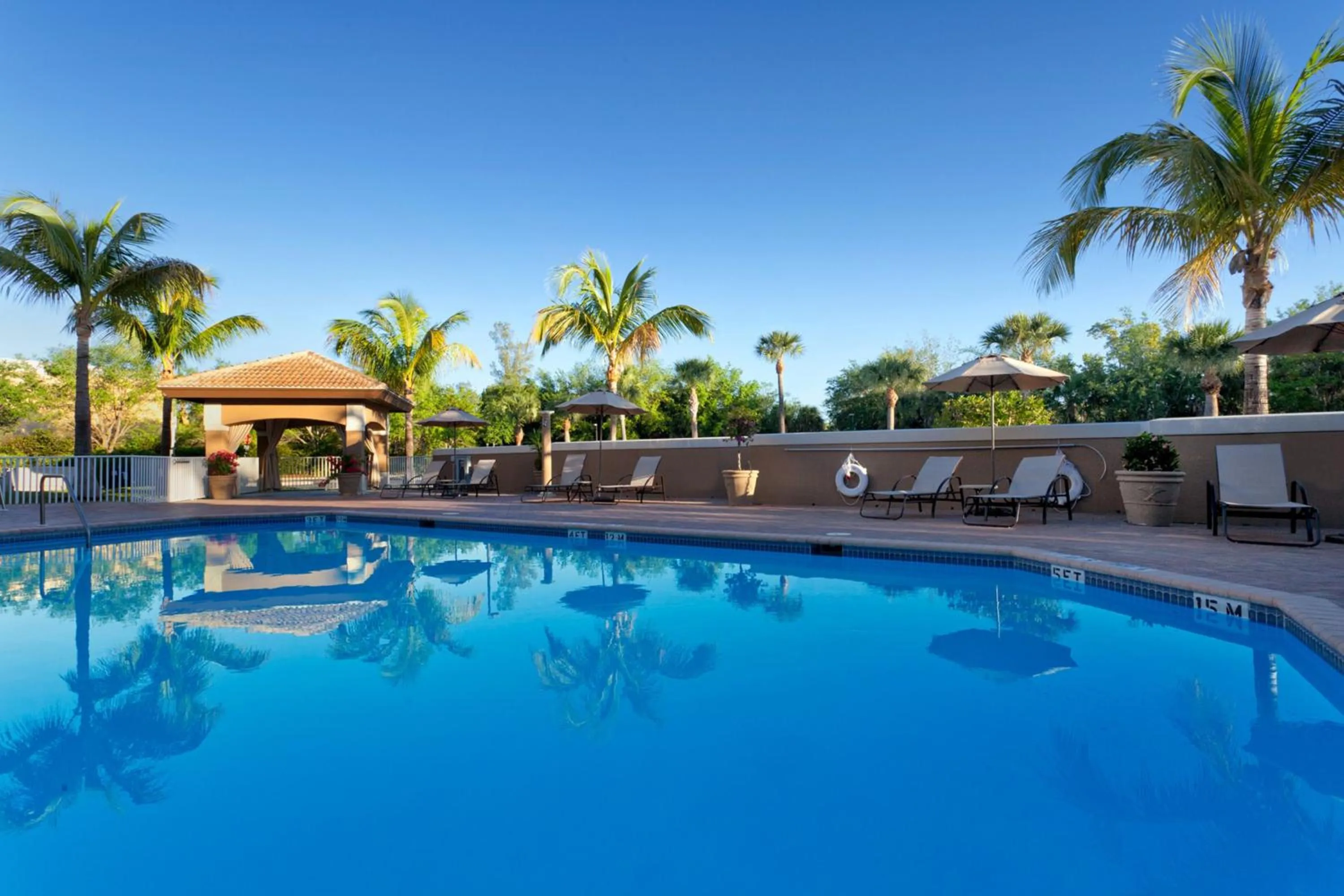 Swimming pool in Holiday Inn Express & Suites Naples Downtown - 5th Avenue by IHG