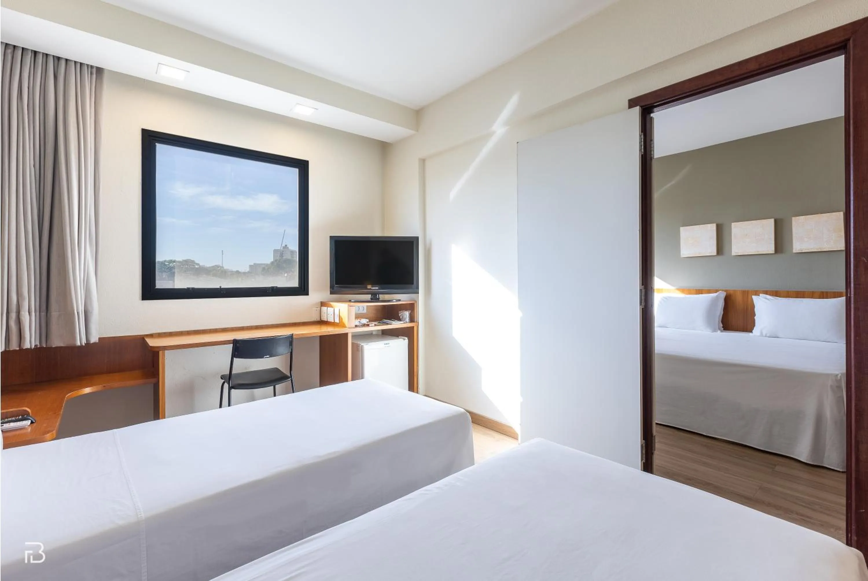 Bed in Executive Inn Hotel