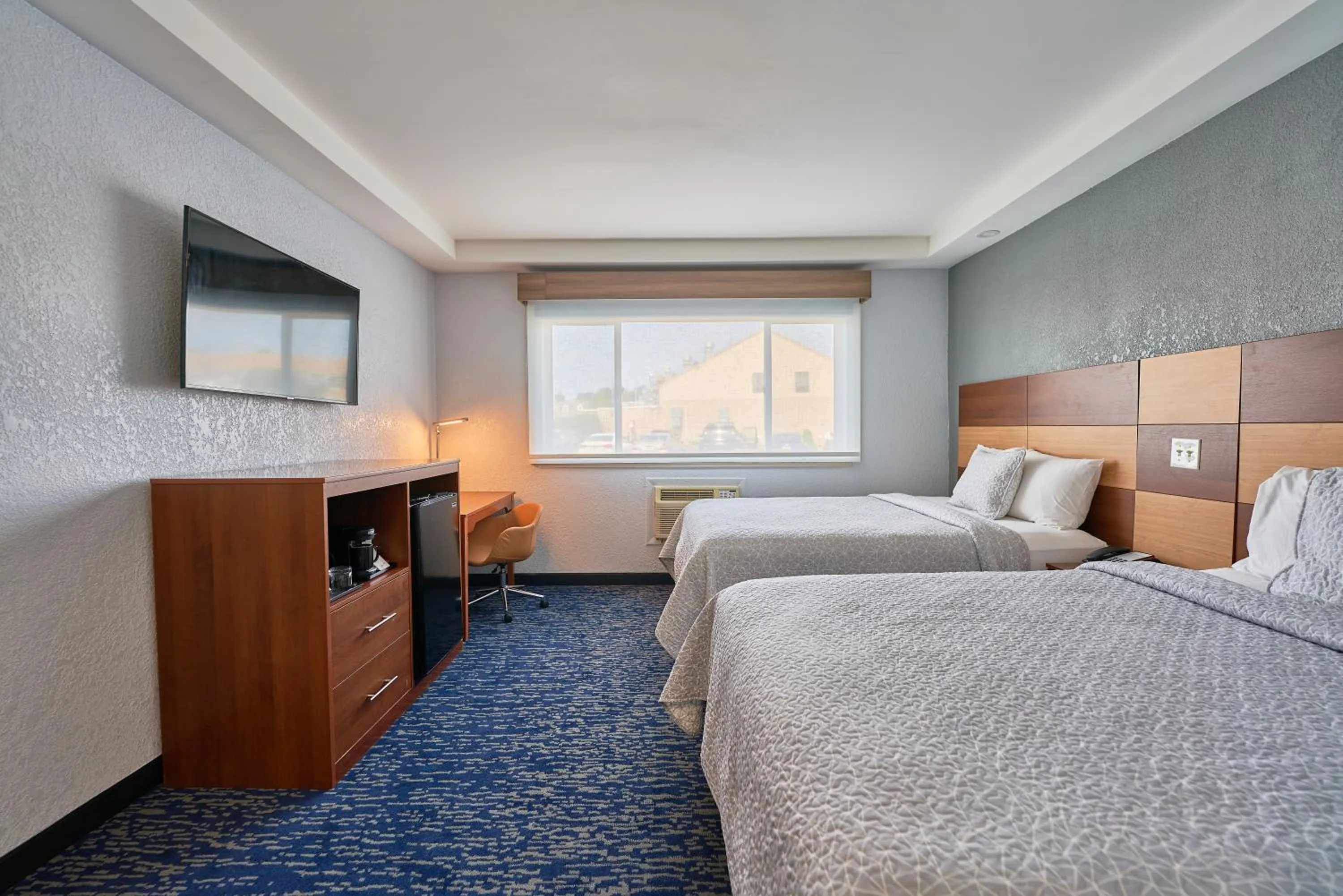 Bed in Hyannis Plaza Hotel