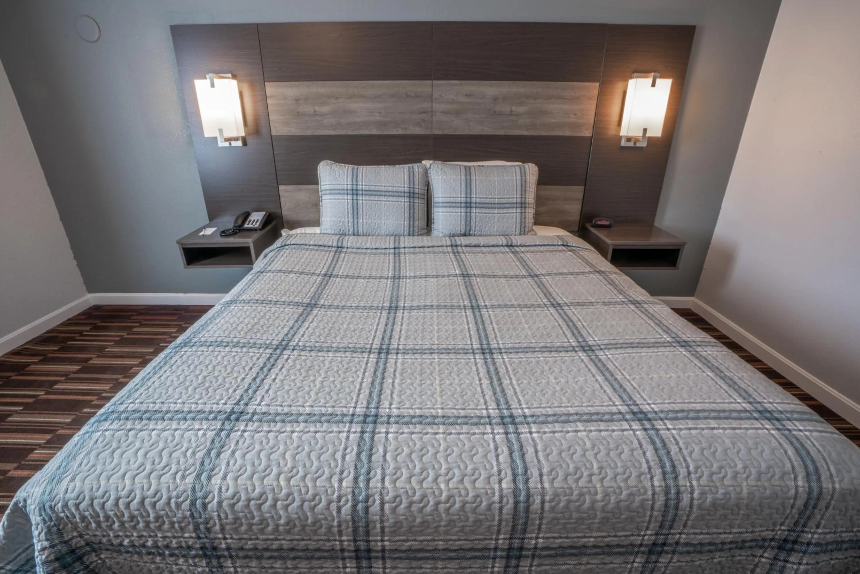 Bed in Hyannis Plaza Hotel