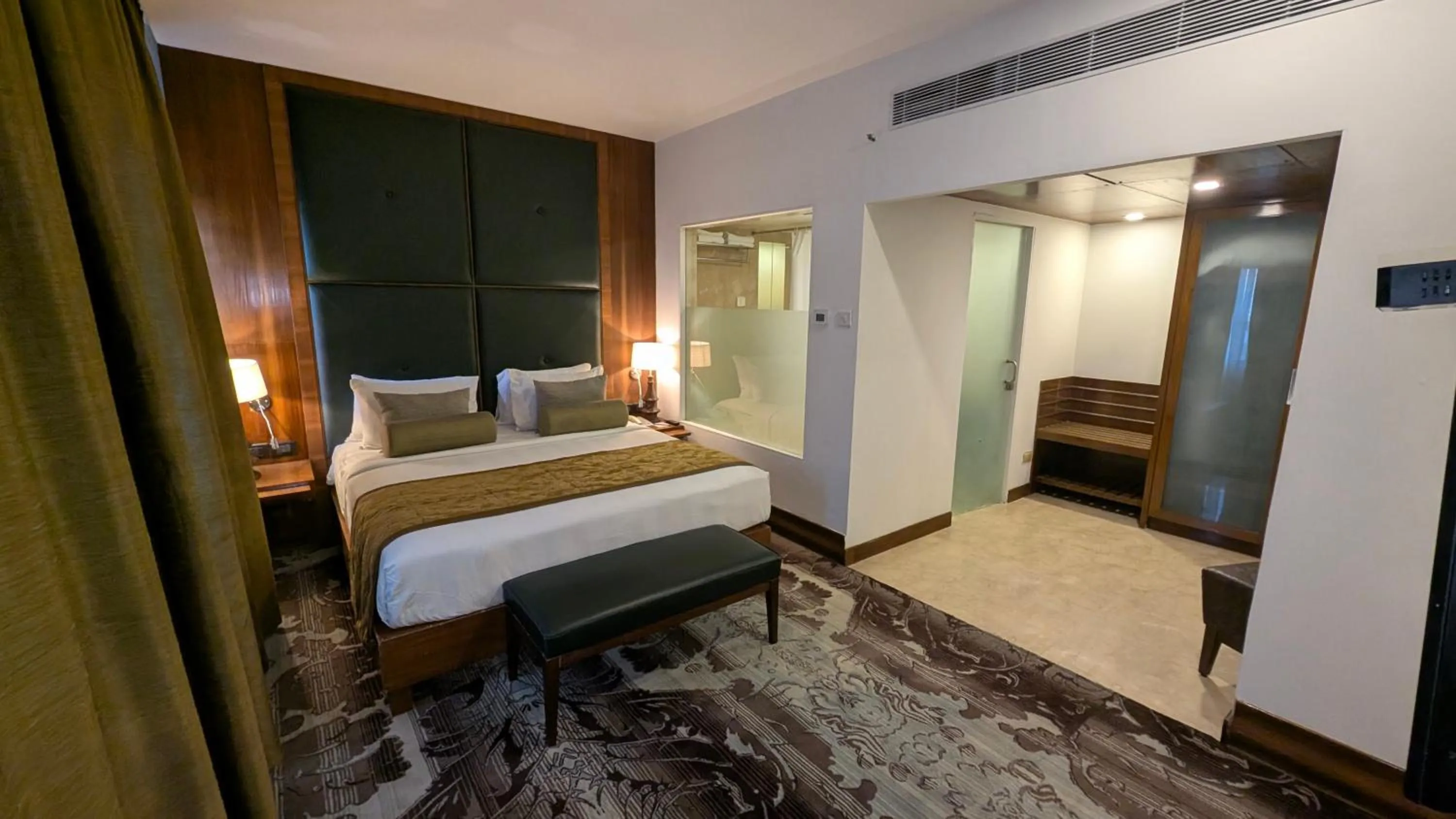 Bed in Pride Hotel, Chennai