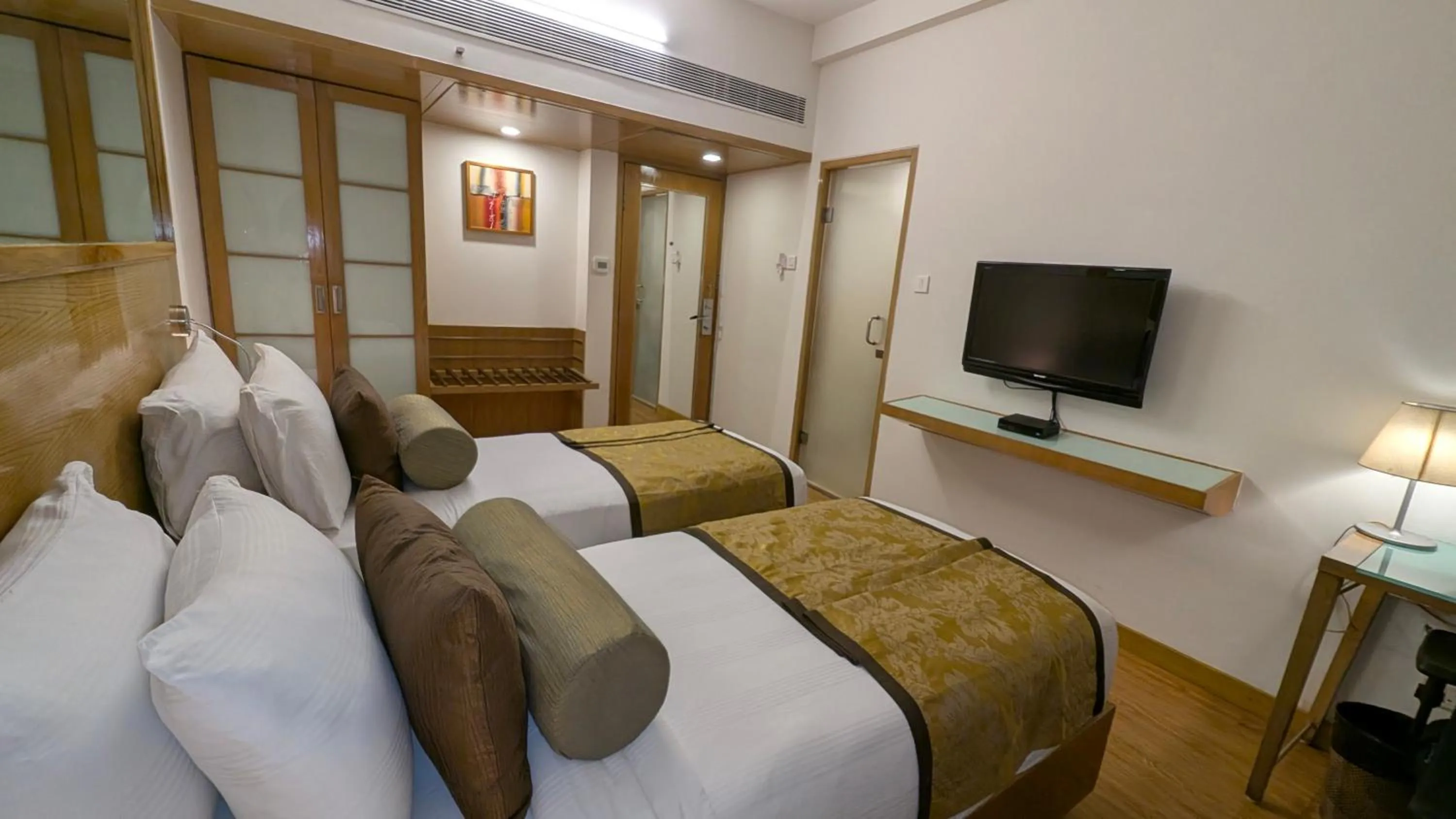 Bed in Pride Hotel, Chennai