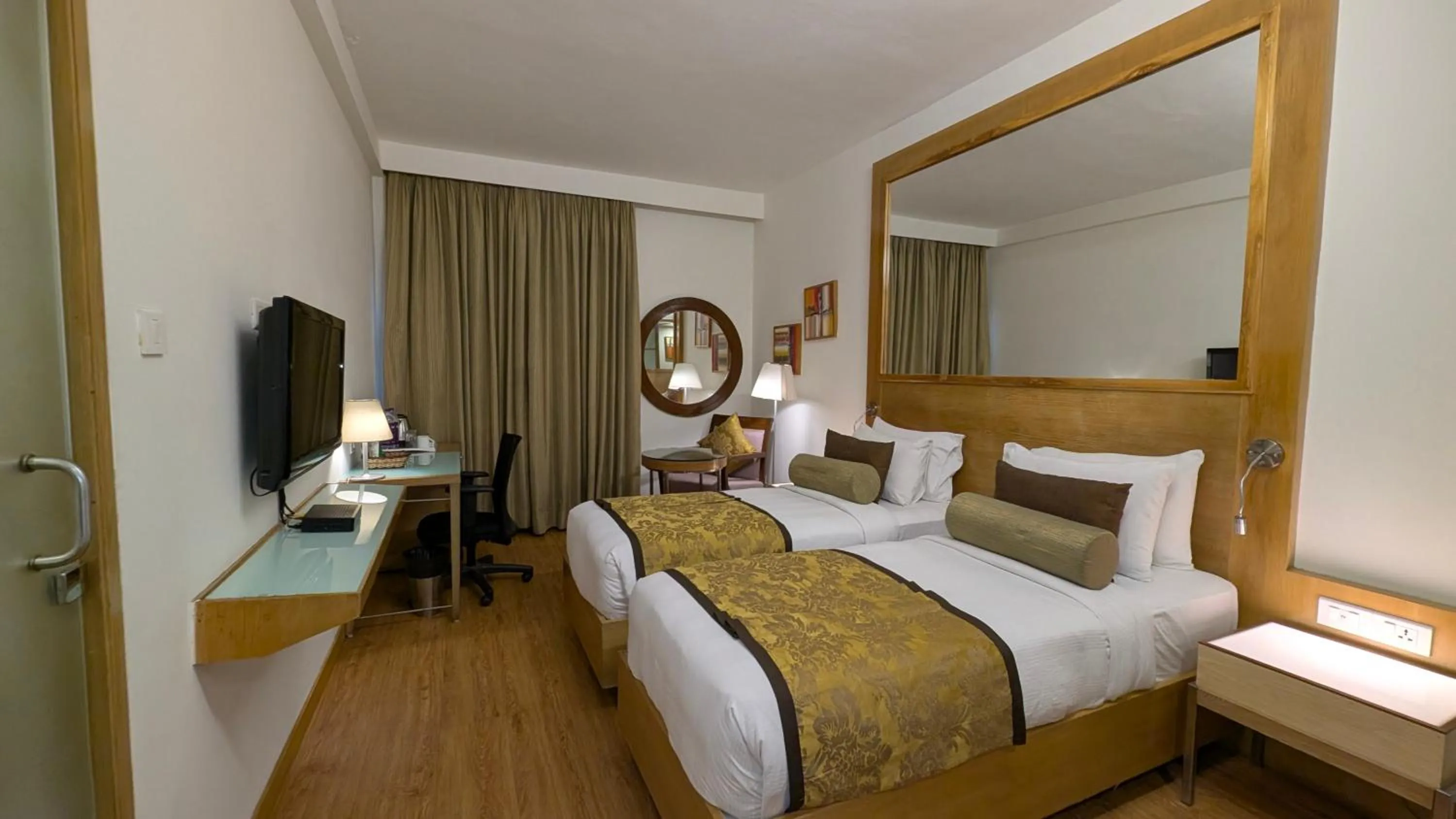 Bed in Pride Hotel, Chennai