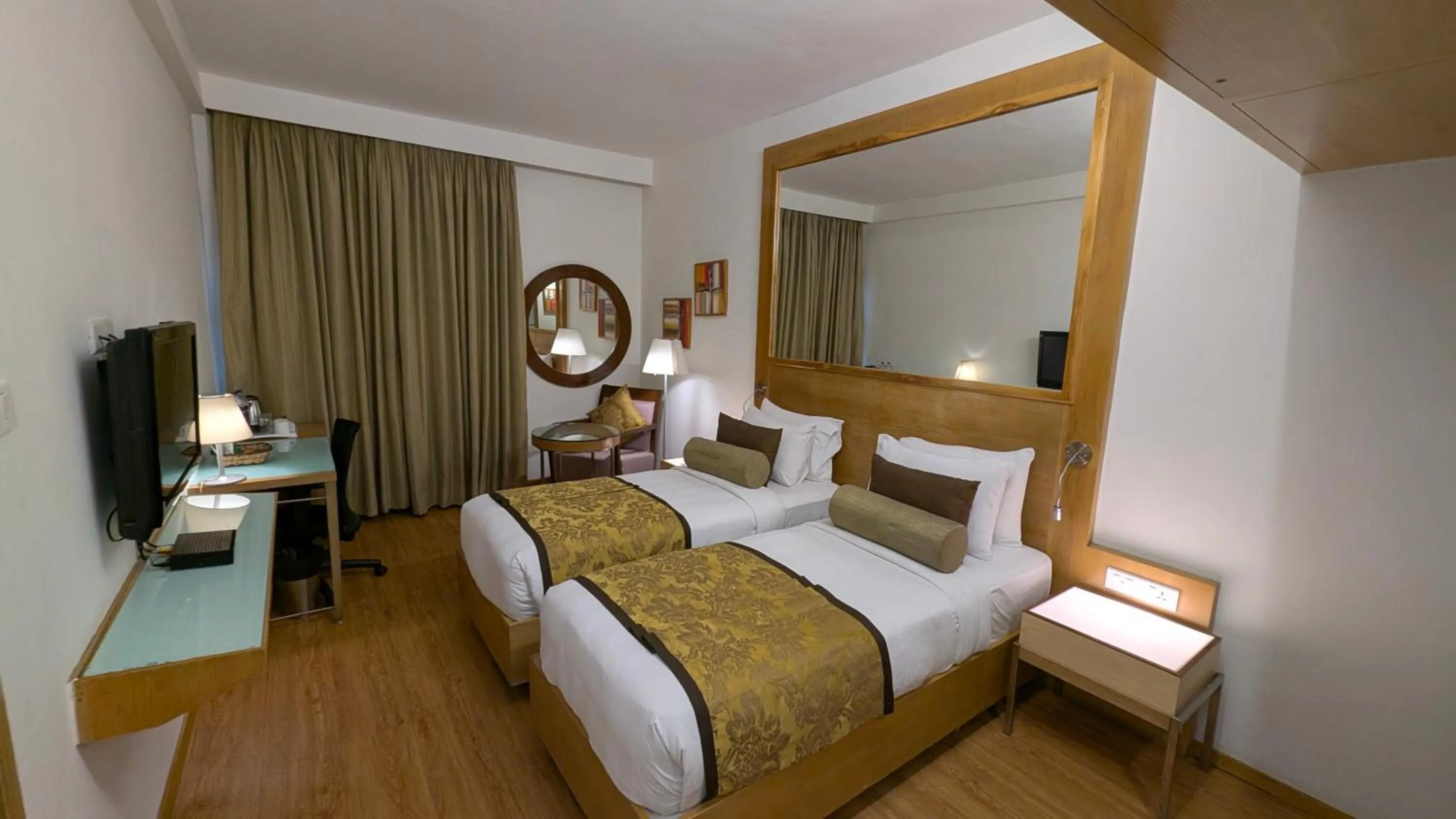 Bed in Pride Hotel, Chennai