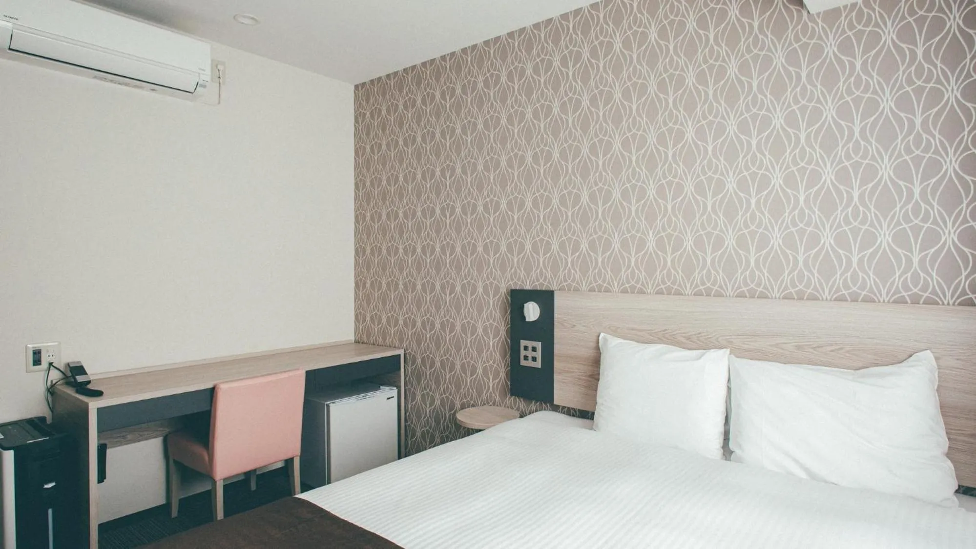 Bed in Kuretake Inn Premium Nagoya Nayabashi