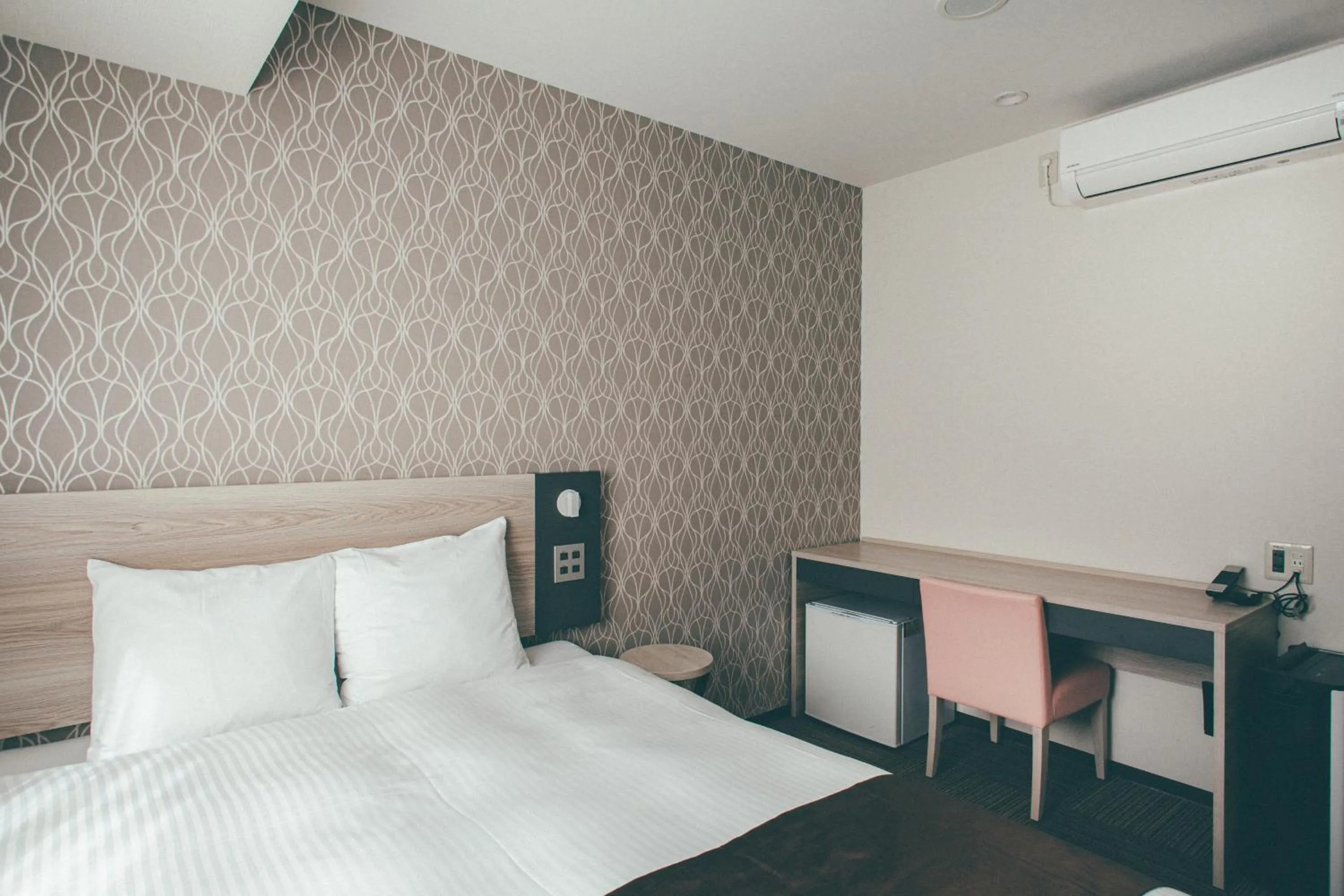 Bed in Kuretake Inn Premium Nagoya Nayabashi