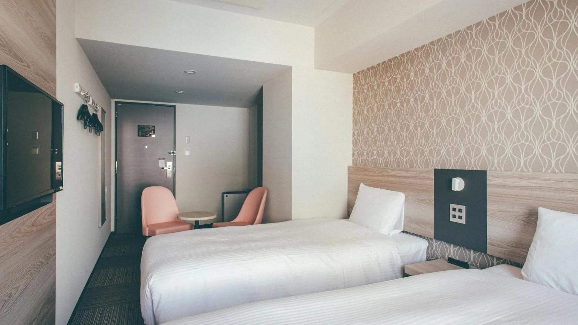 Bed in Kuretake Inn Premium Nagoya Nayabashi