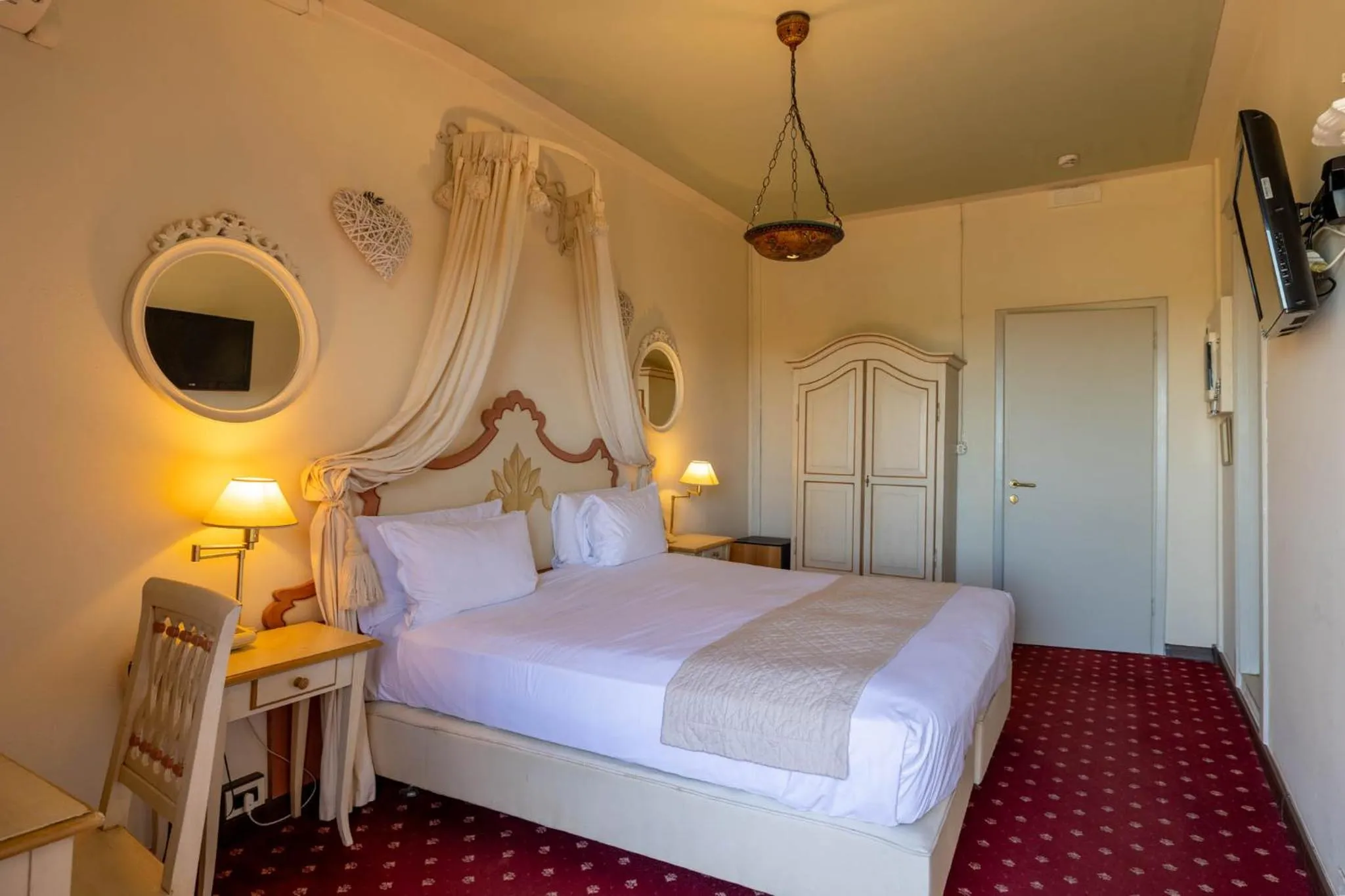 Bed in Quattro Gigli Hotel