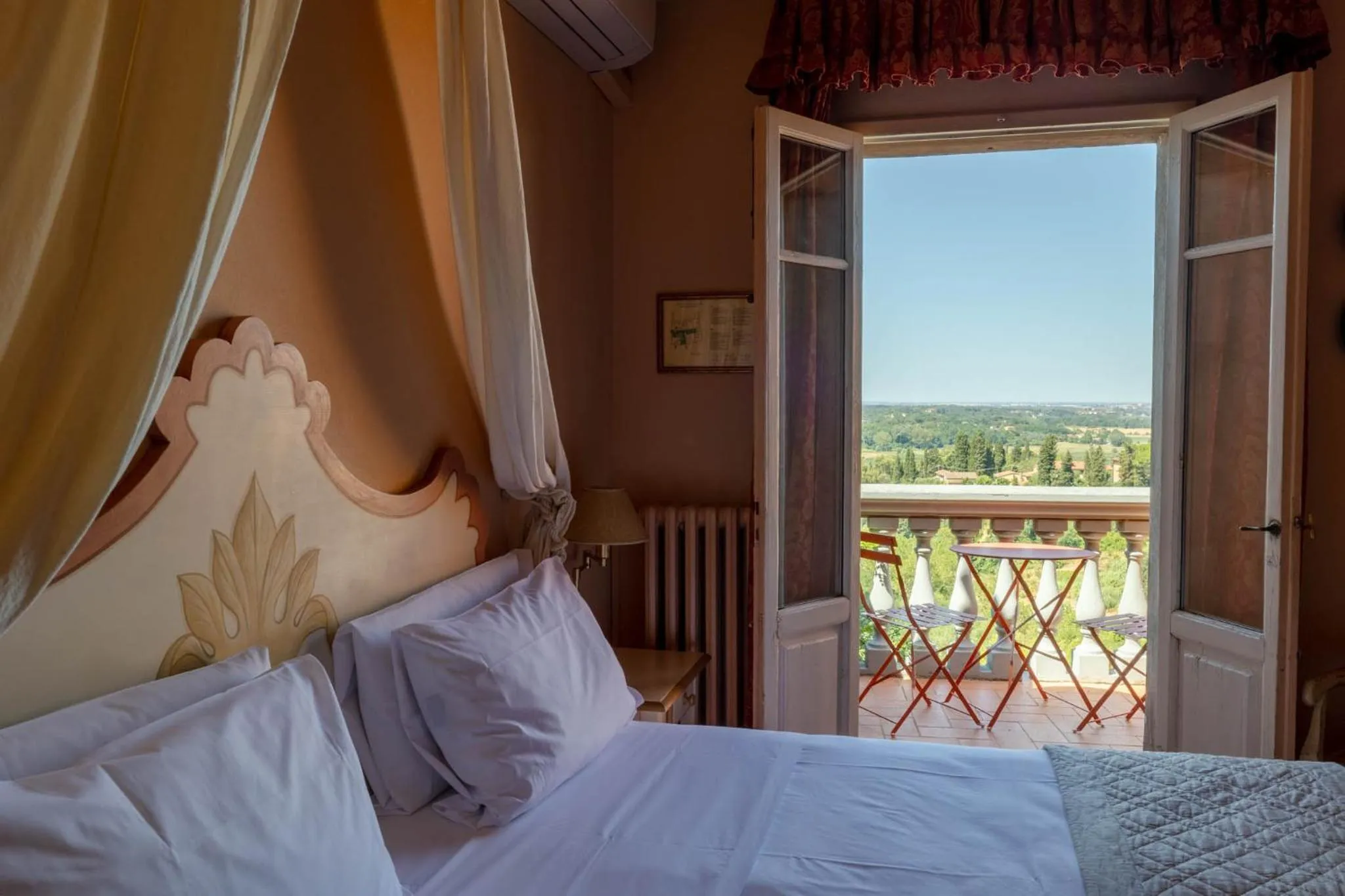 Bed in Quattro Gigli Hotel