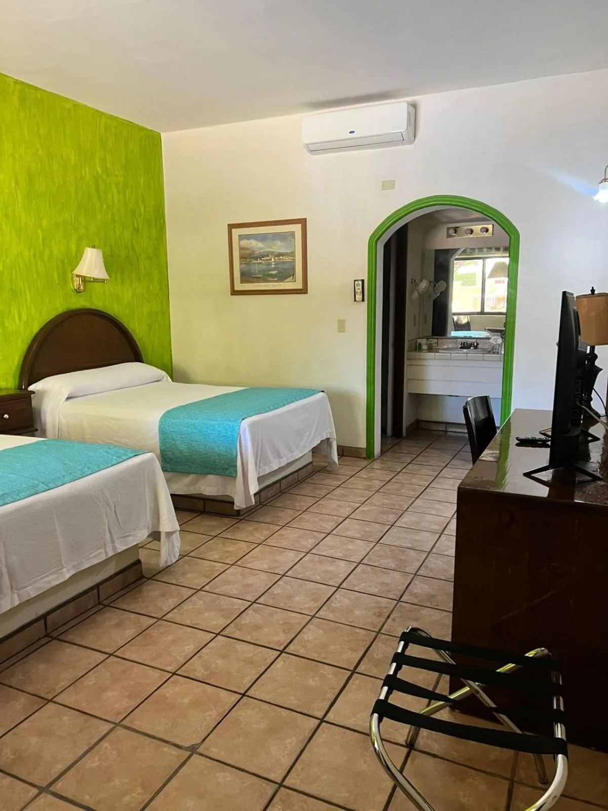 Bed in Hacienda Suites Loreto