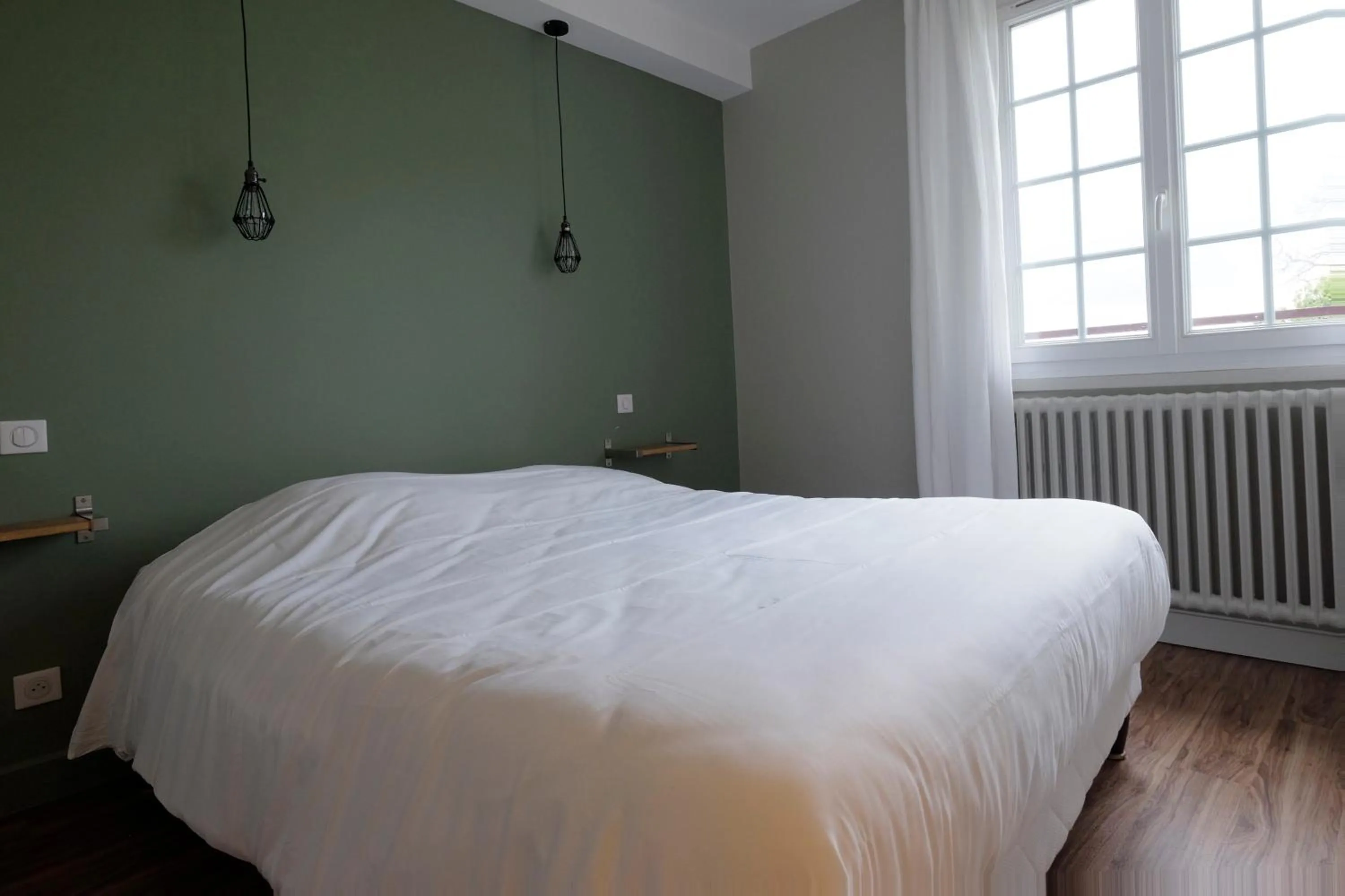 Bed in Logis Hotel Le Relais du Teulet