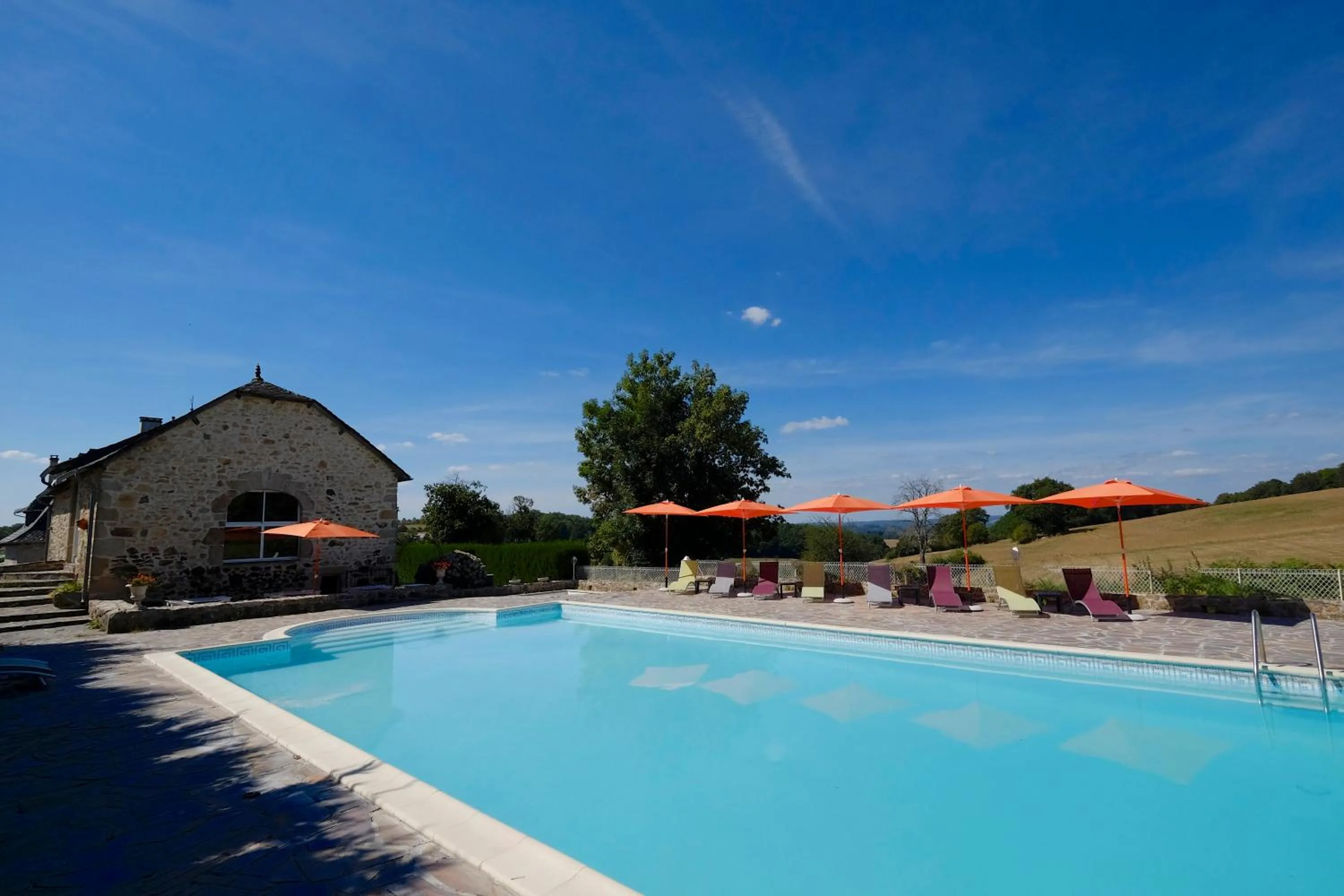 Swimming pool in Logis Hotel Le Relais du Teulet