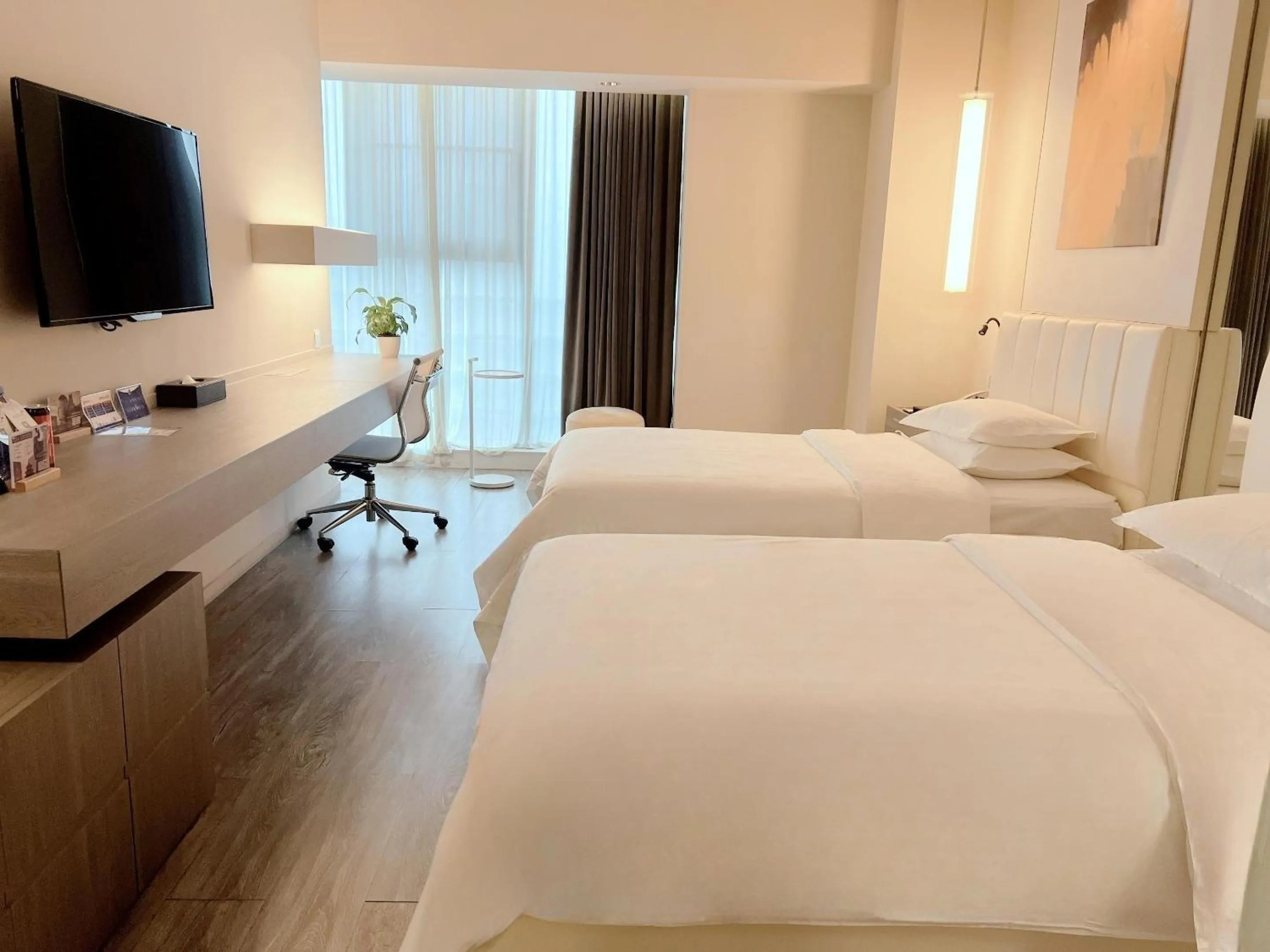 Bed in Jinjiang Metropolo Hotel Hangzhou East Railway Station