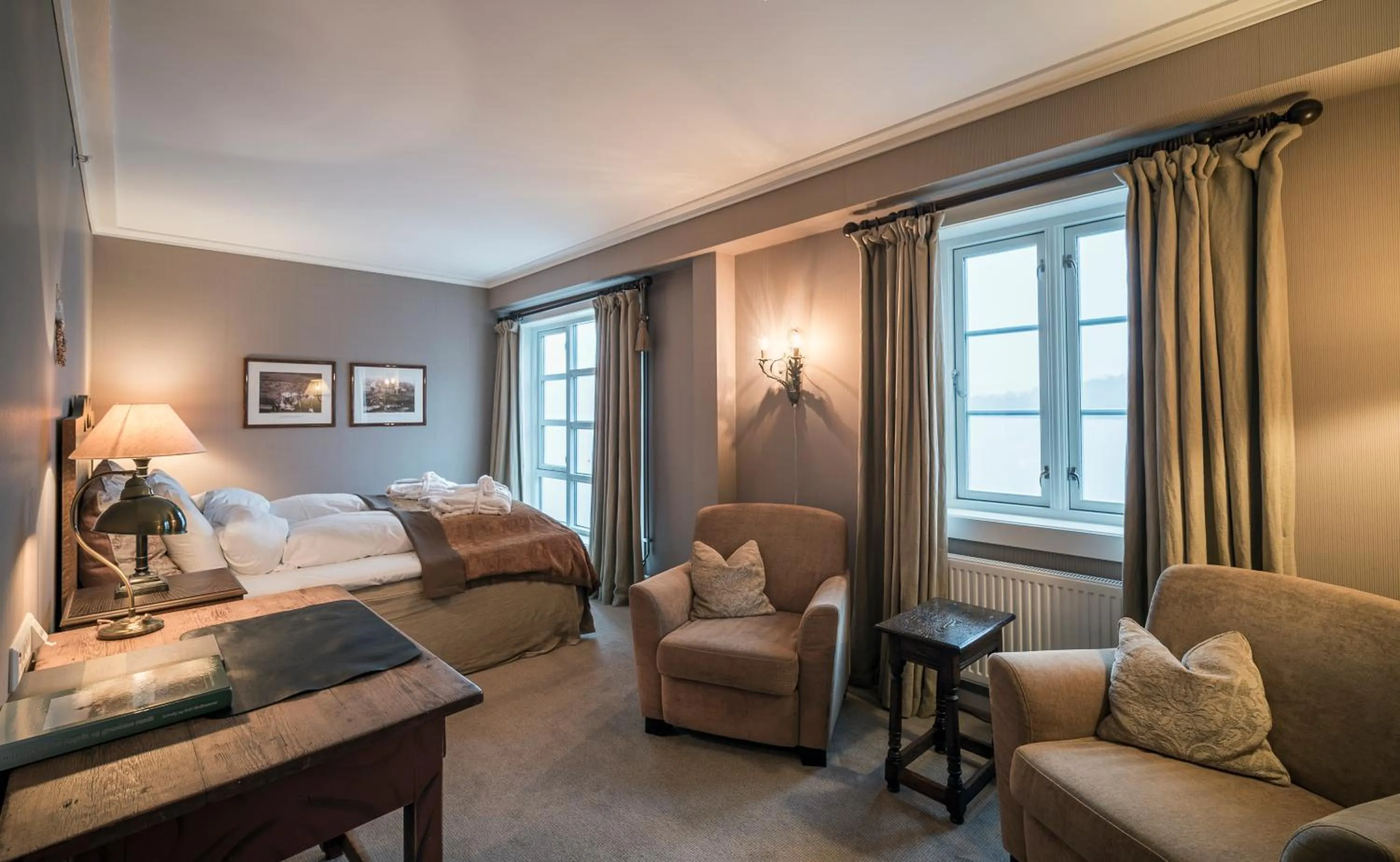 Photo of the whole room, Bed in Angvik Gamle Handelssted - by Classic Norway Hotels