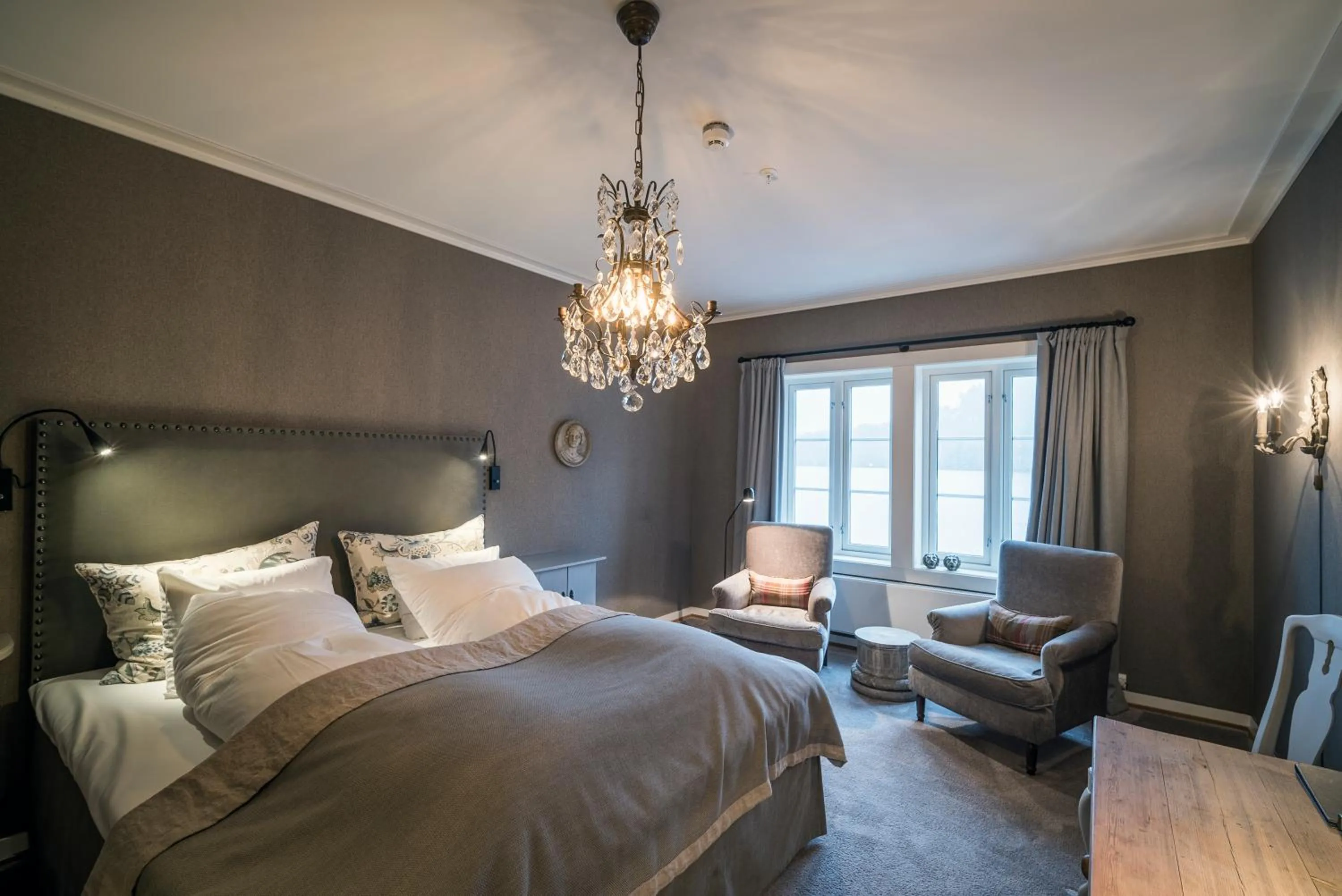 Photo of the whole room, Bed in Angvik Gamle Handelssted - by Classic Norway Hotels