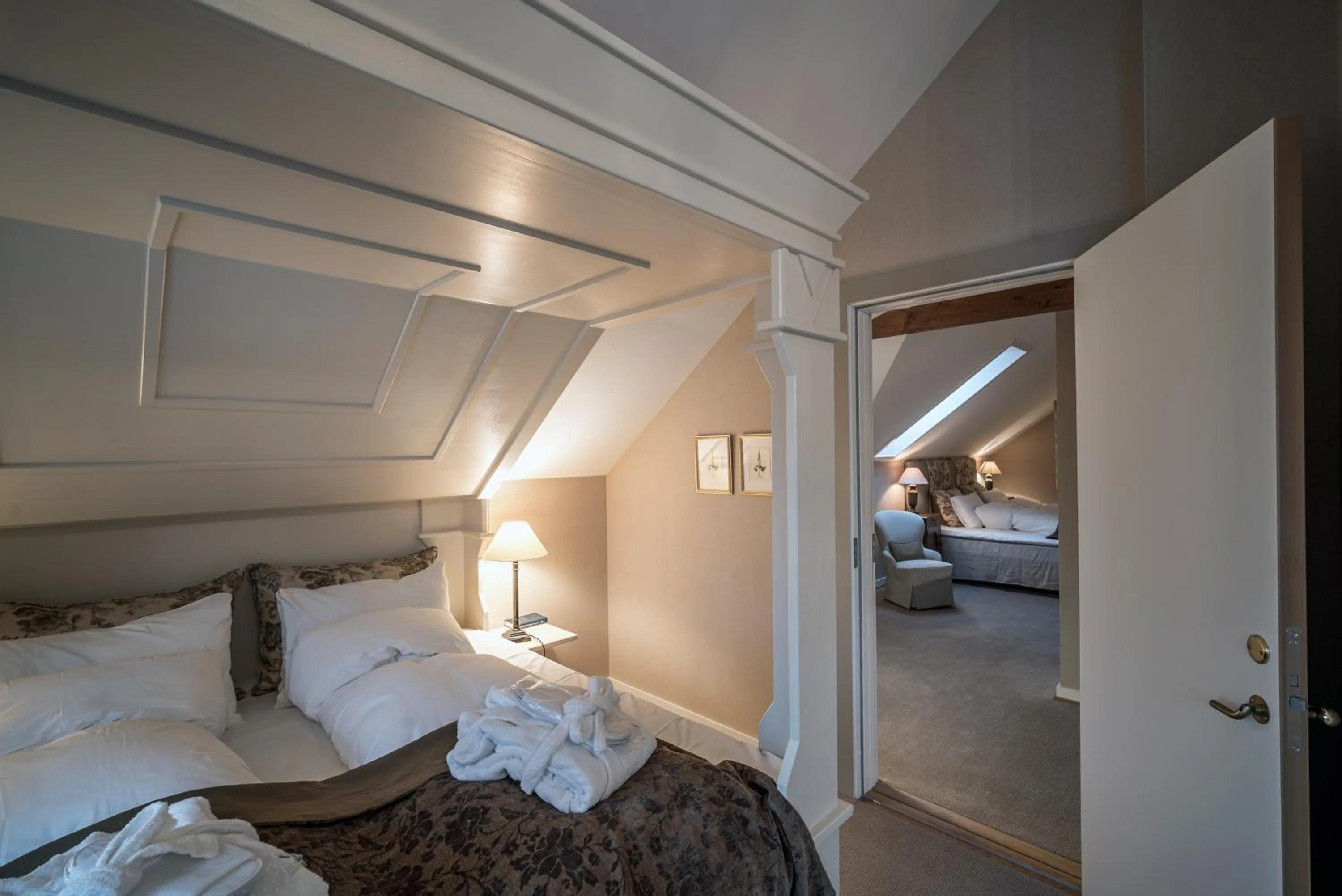 Photo of the whole room, Bed in Angvik Gamle Handelssted - by Classic Norway Hotels