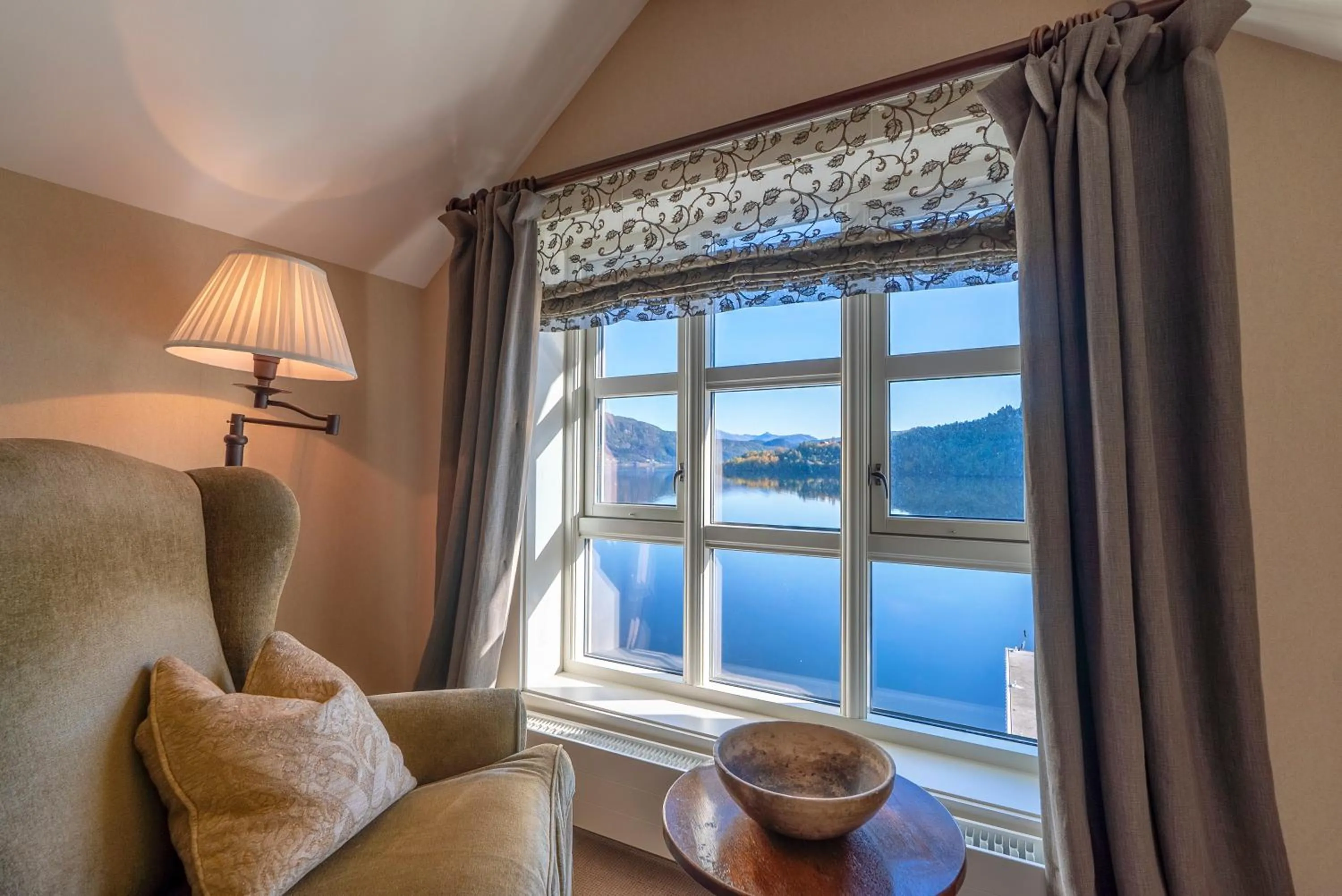 Seating area in Angvik Gamle Handelssted - by Classic Norway Hotels