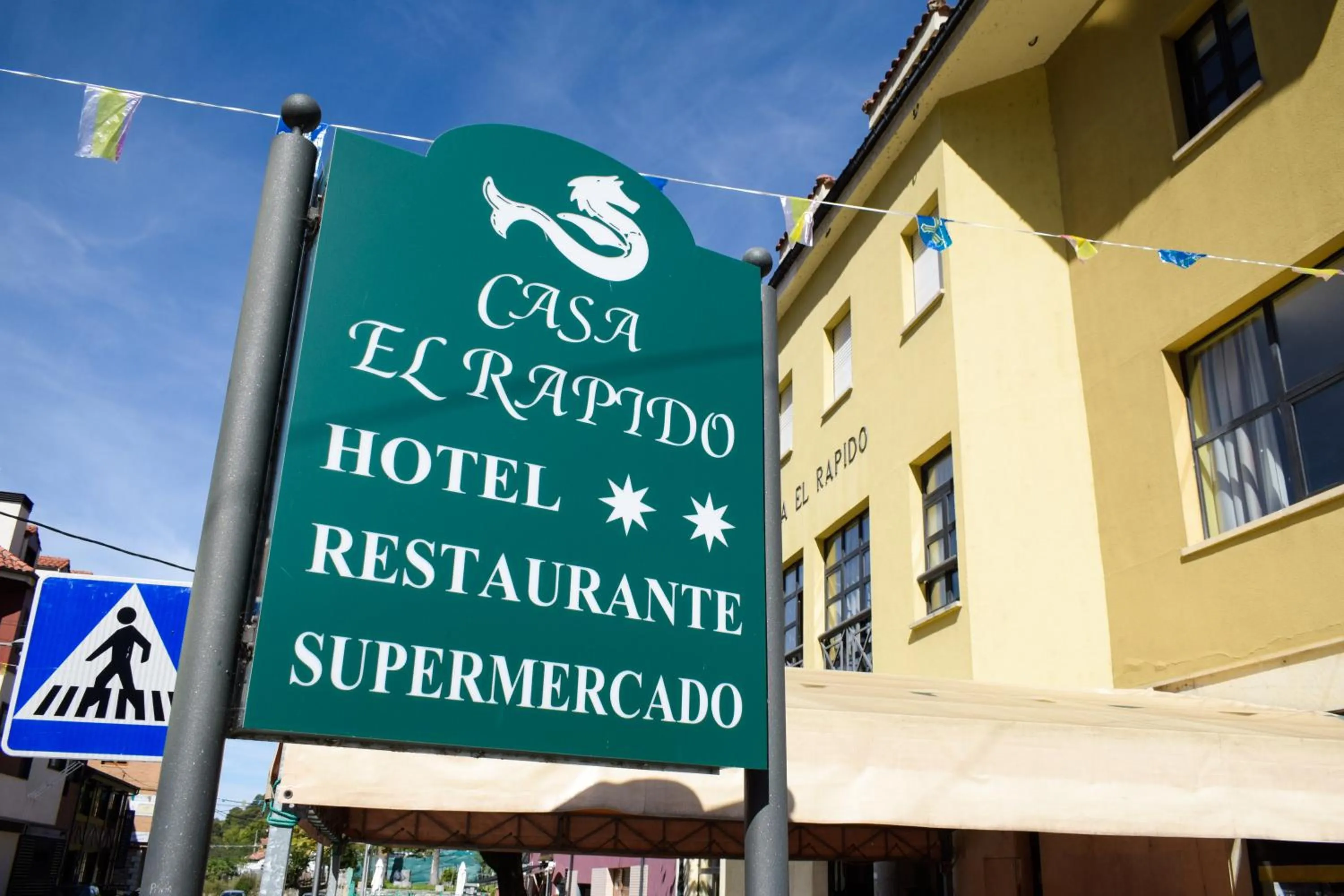 Property logo or sign in Hotel Casa El Rapido