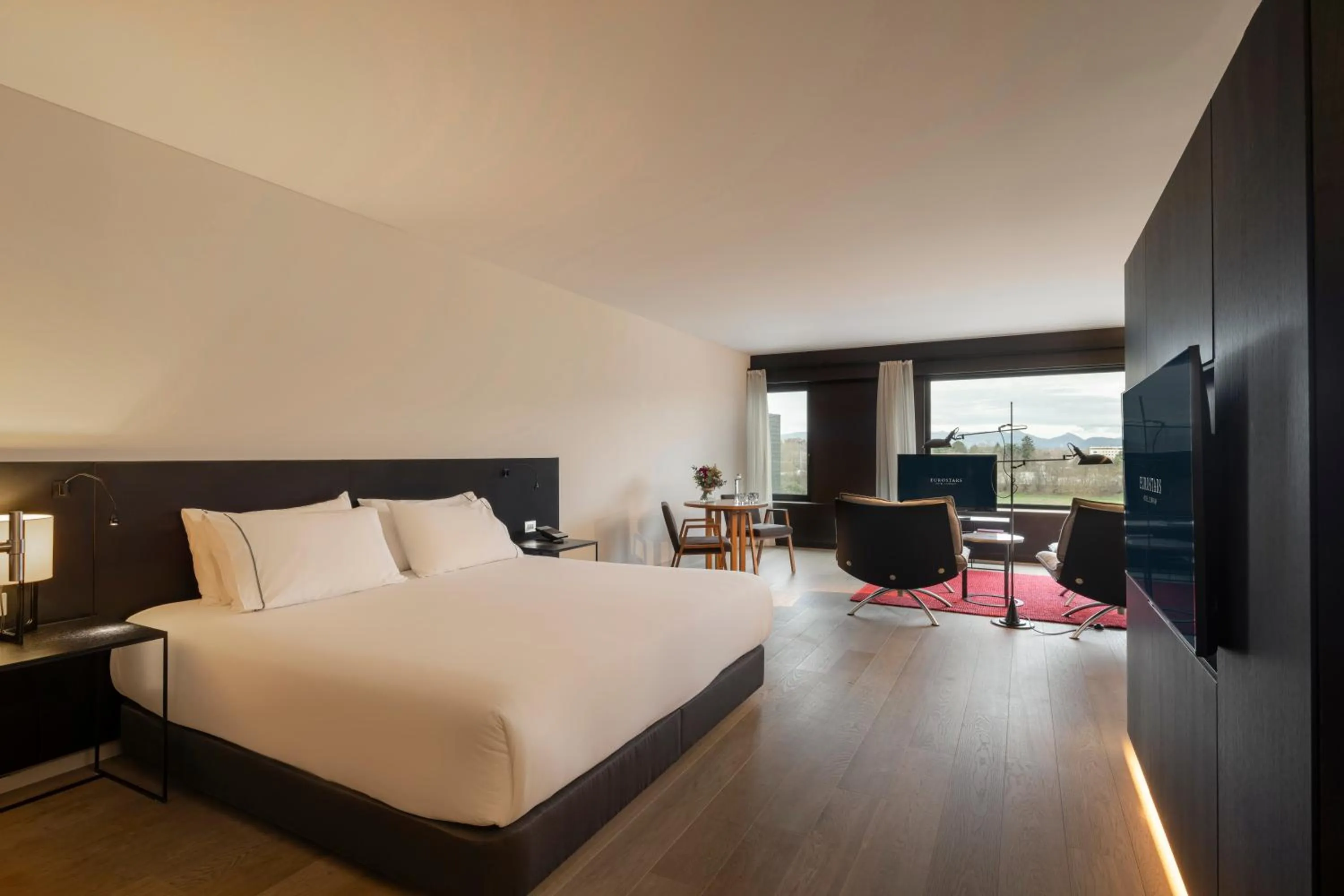 Photo of the whole room, Bed in Eurostars Pamplona