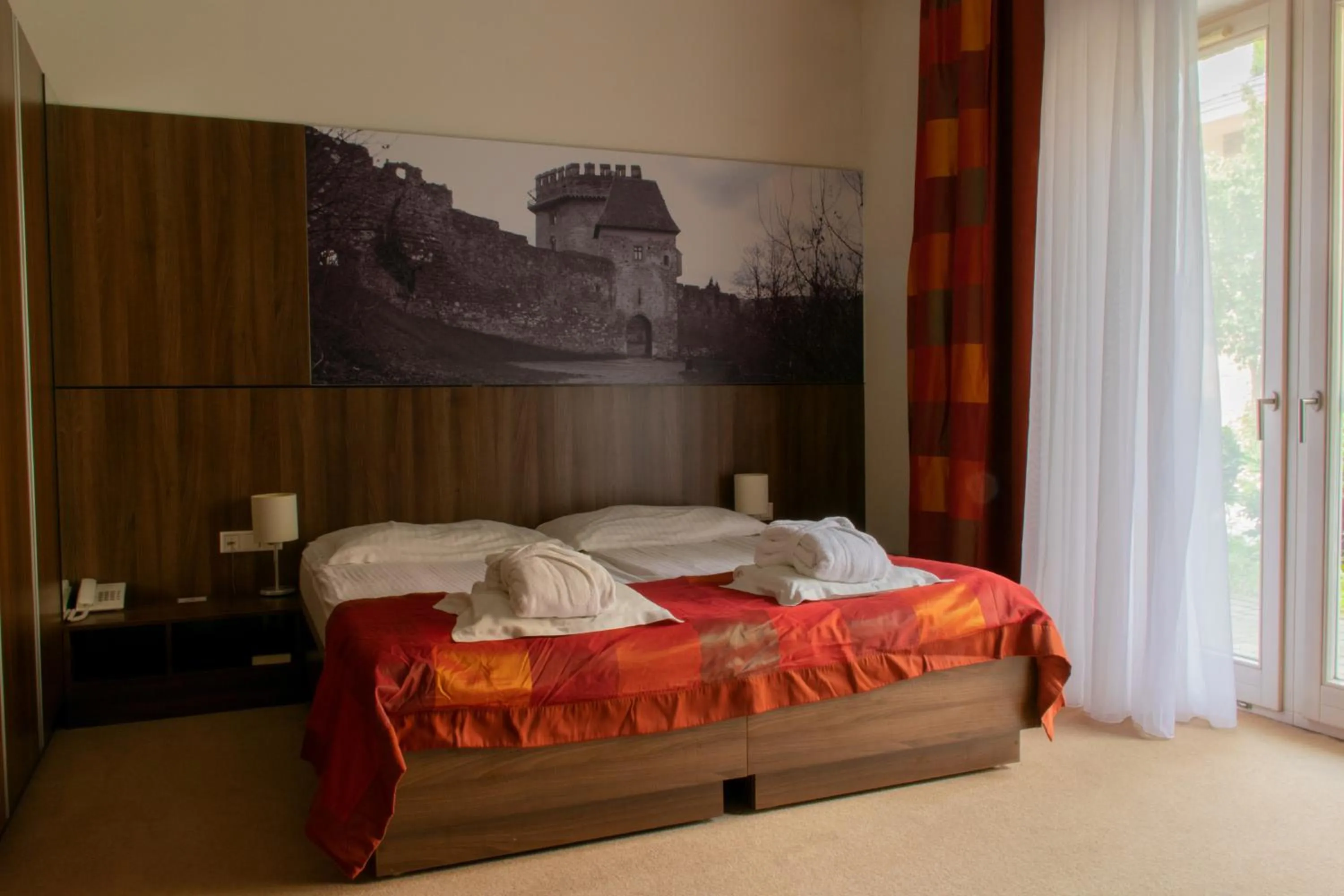 Bed in Royal Club Hotel