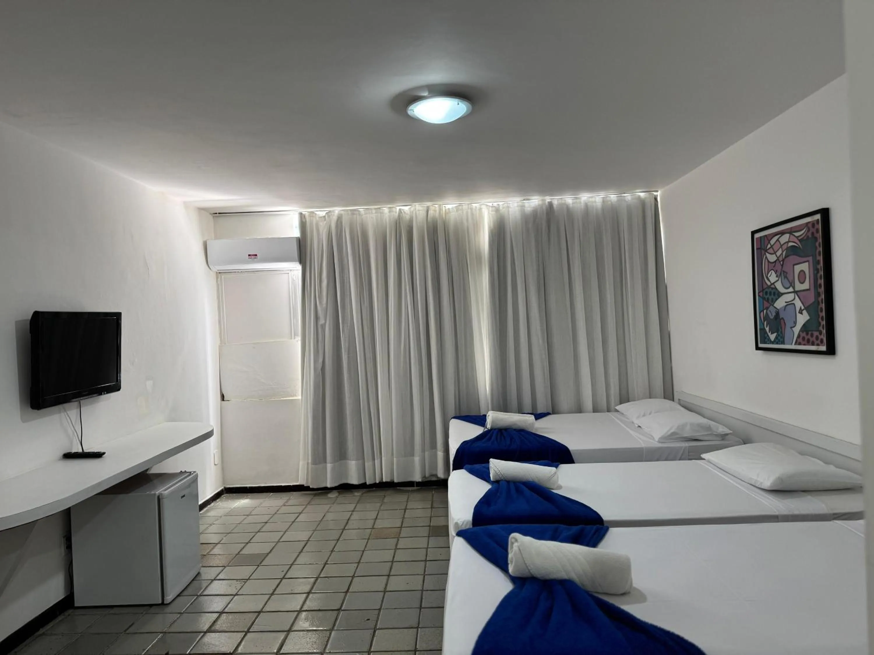 Photo of the whole room, Bed in Praia Hotel Enseada