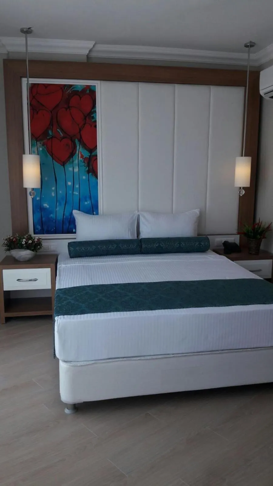 Bed in Exelans Hotel