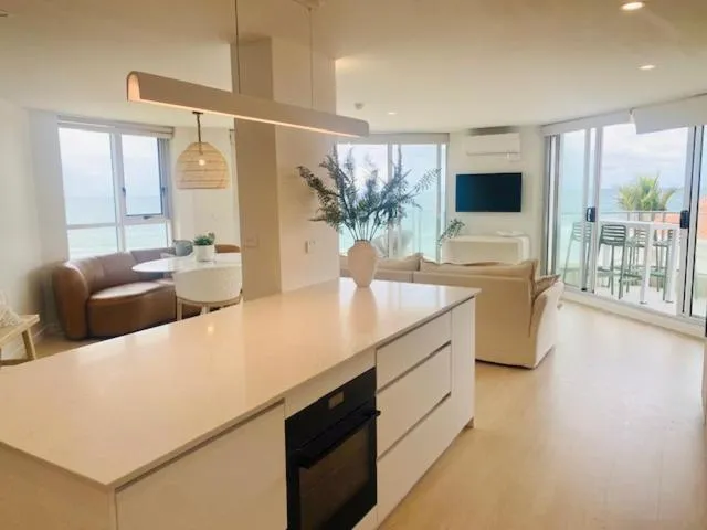 Communal lounge/ TV room in Foreshore Beachfront Apartments