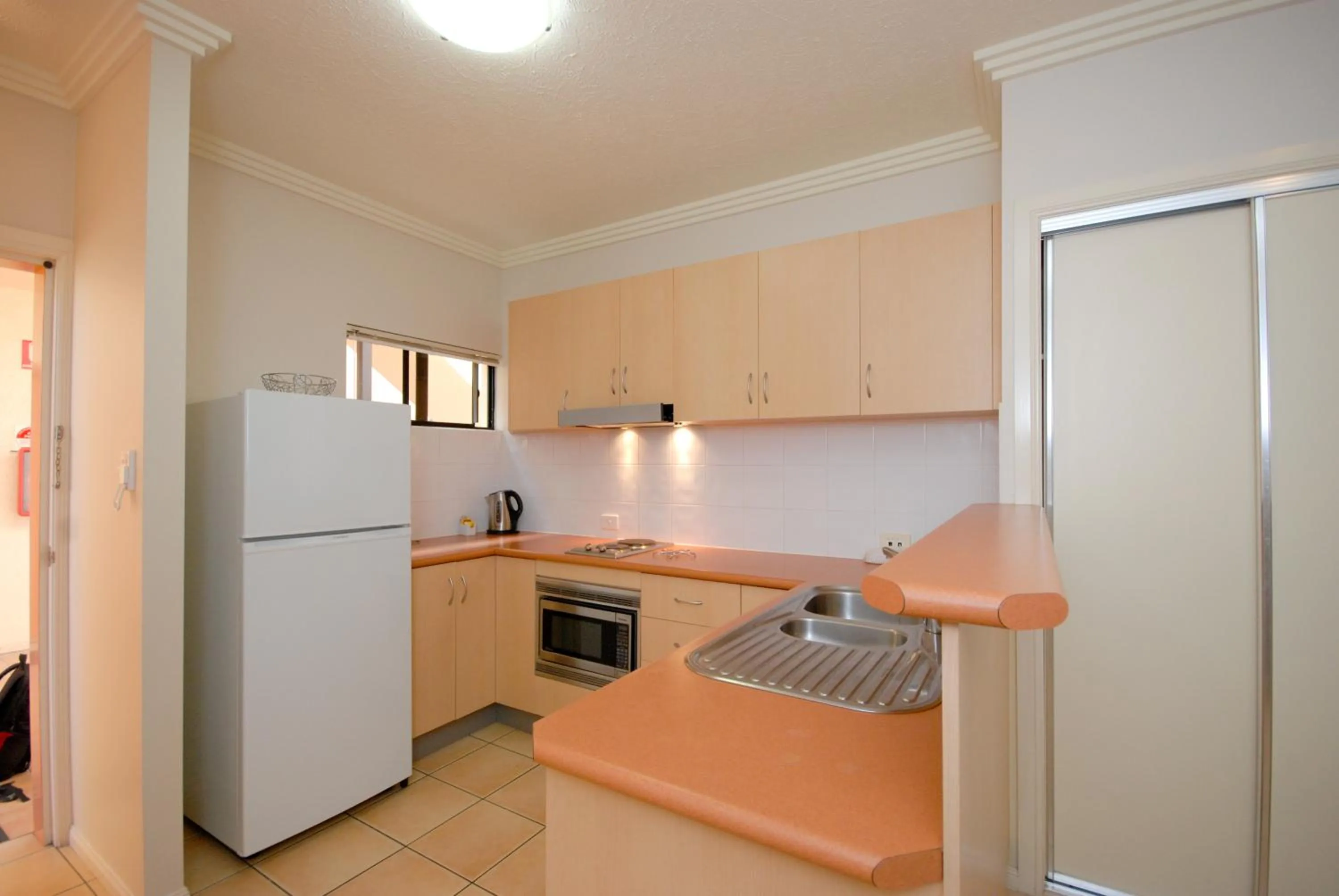 Kitchen or kitchenette in City Plaza Apartments