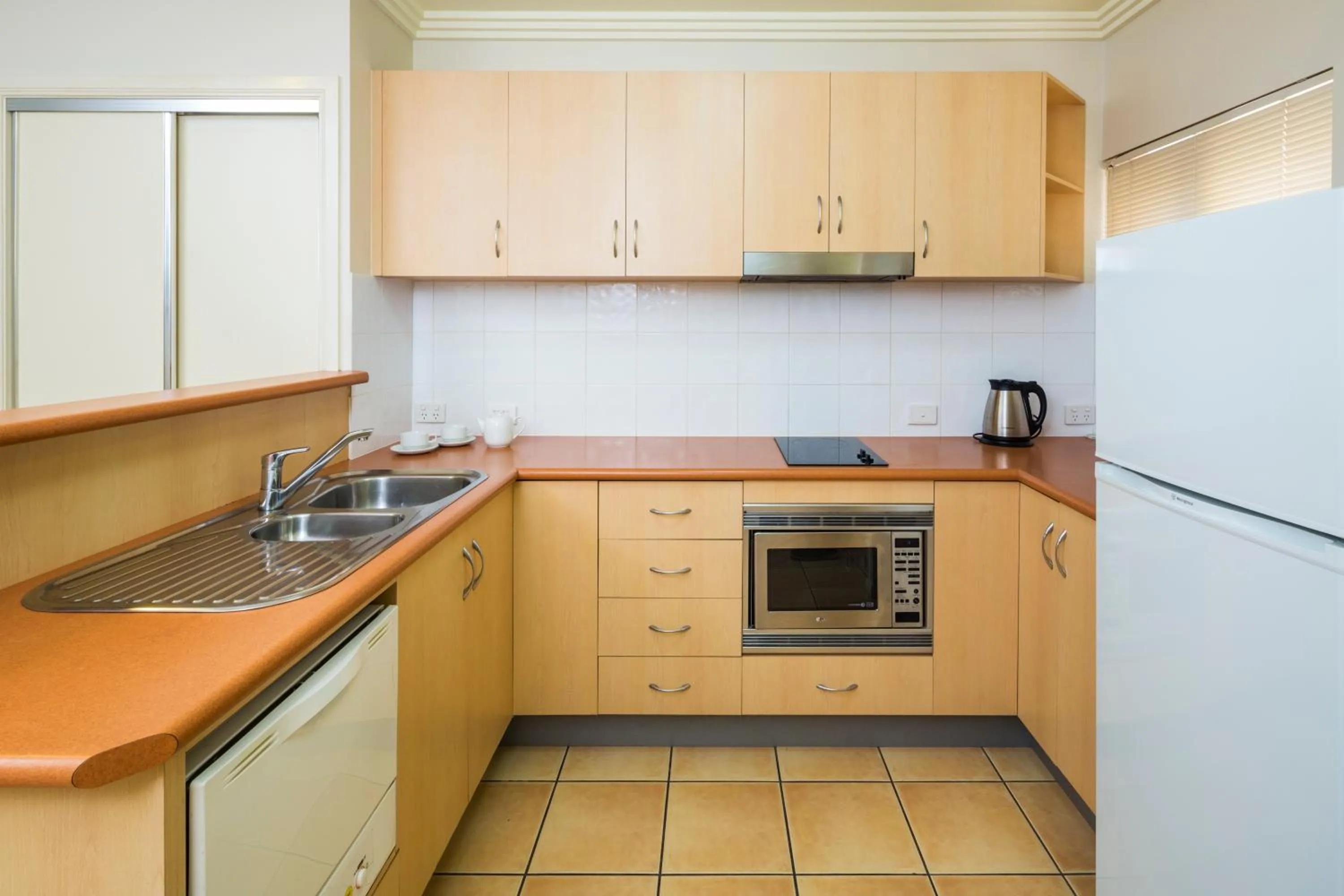 Kitchen or kitchenette in City Plaza Apartments