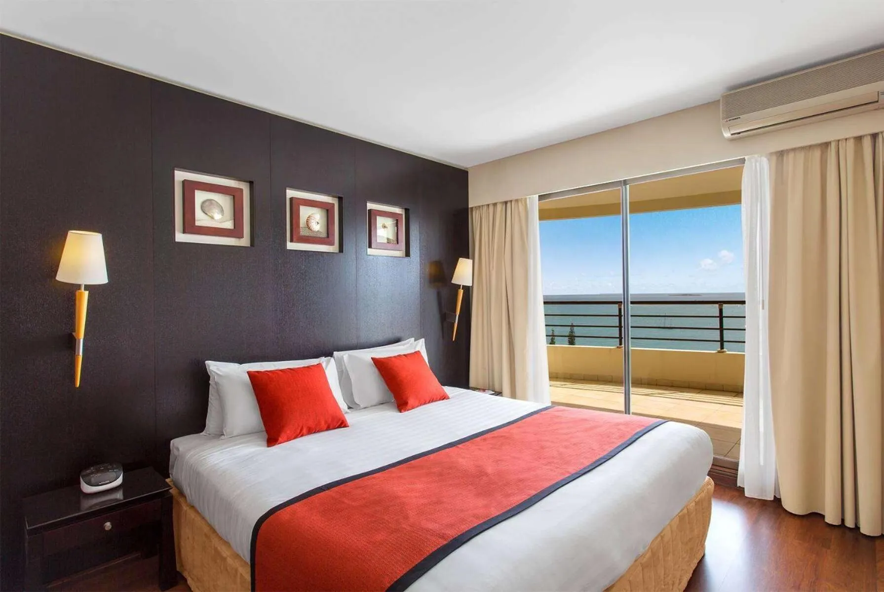 Photo of the whole room, Bed in Ramada Hotel & Suites by Wyndham Noumea