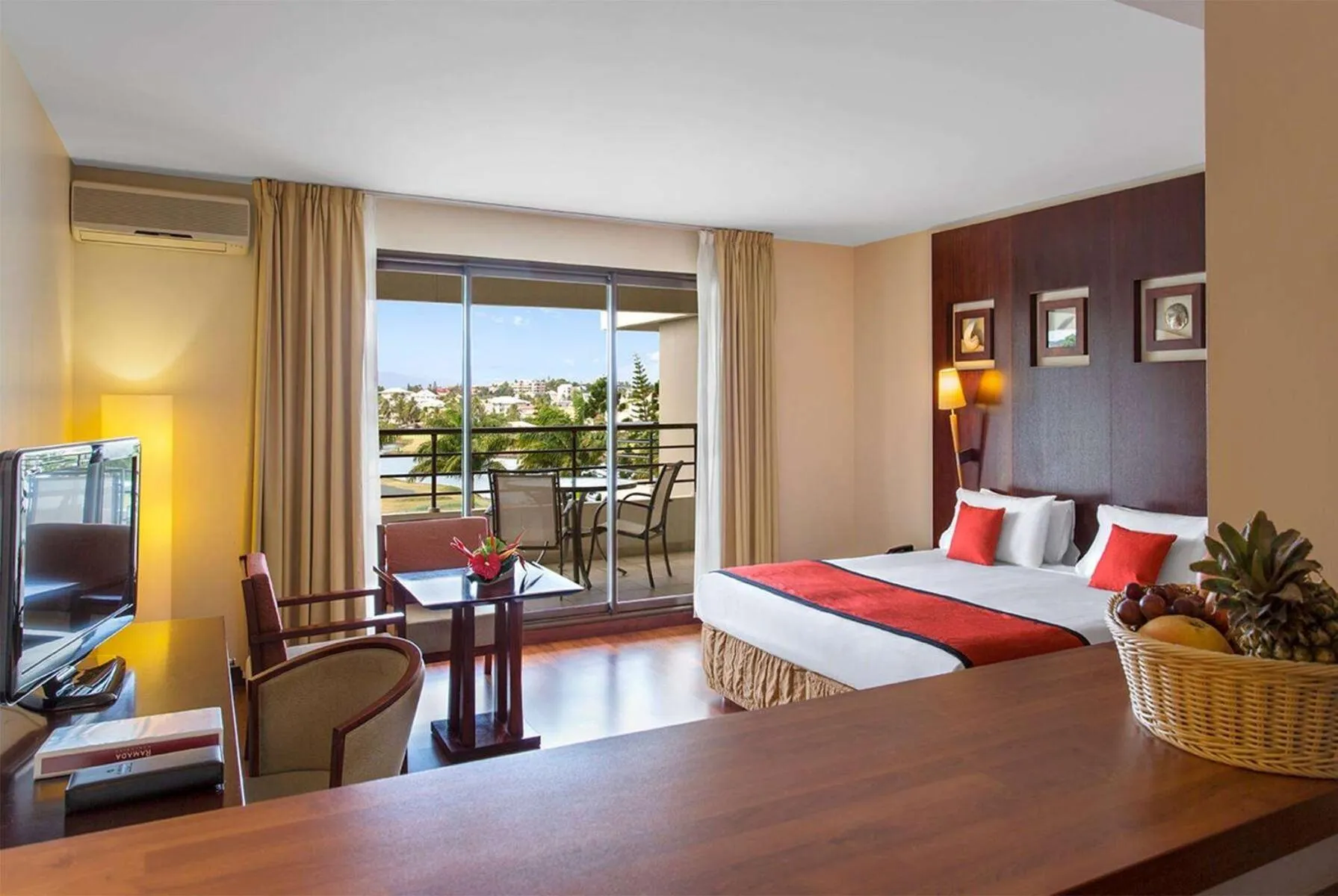 Photo of the whole room, Bed in Ramada Hotel & Suites by Wyndham Noumea