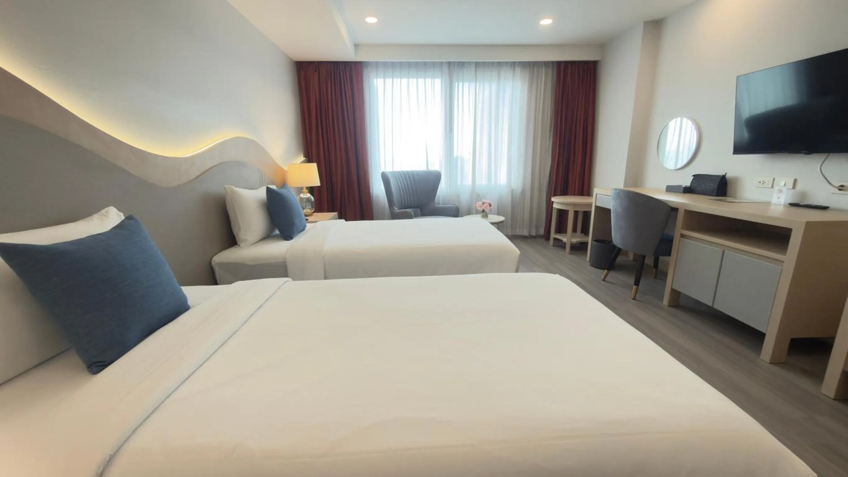 Bed in Empress Pattaya Hotel