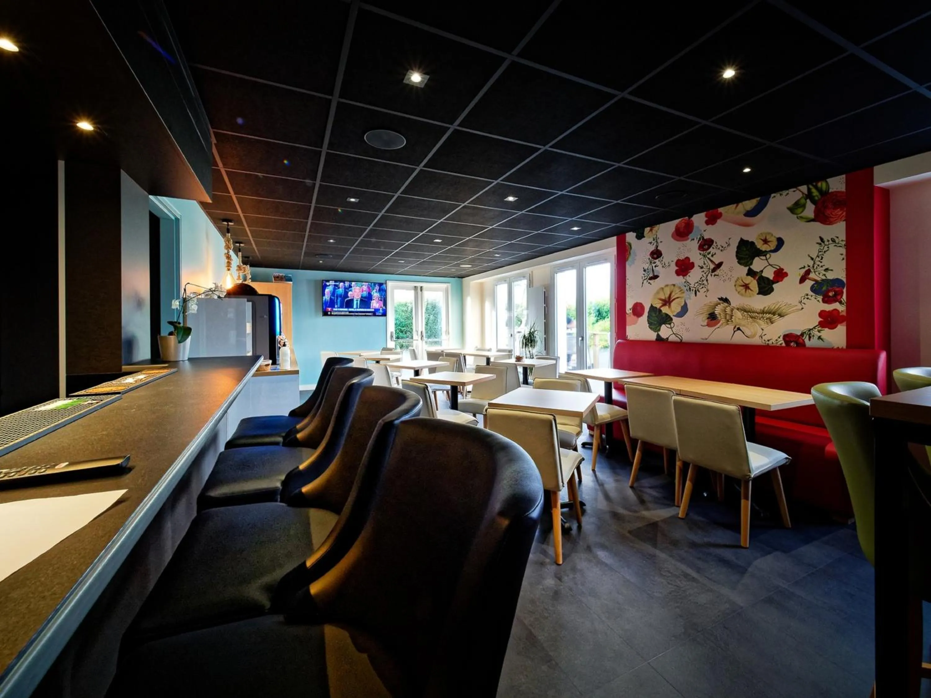 Communal lounge/ TV room in Kyriad DIRECT Saint Brieuc - Parc des Expositions