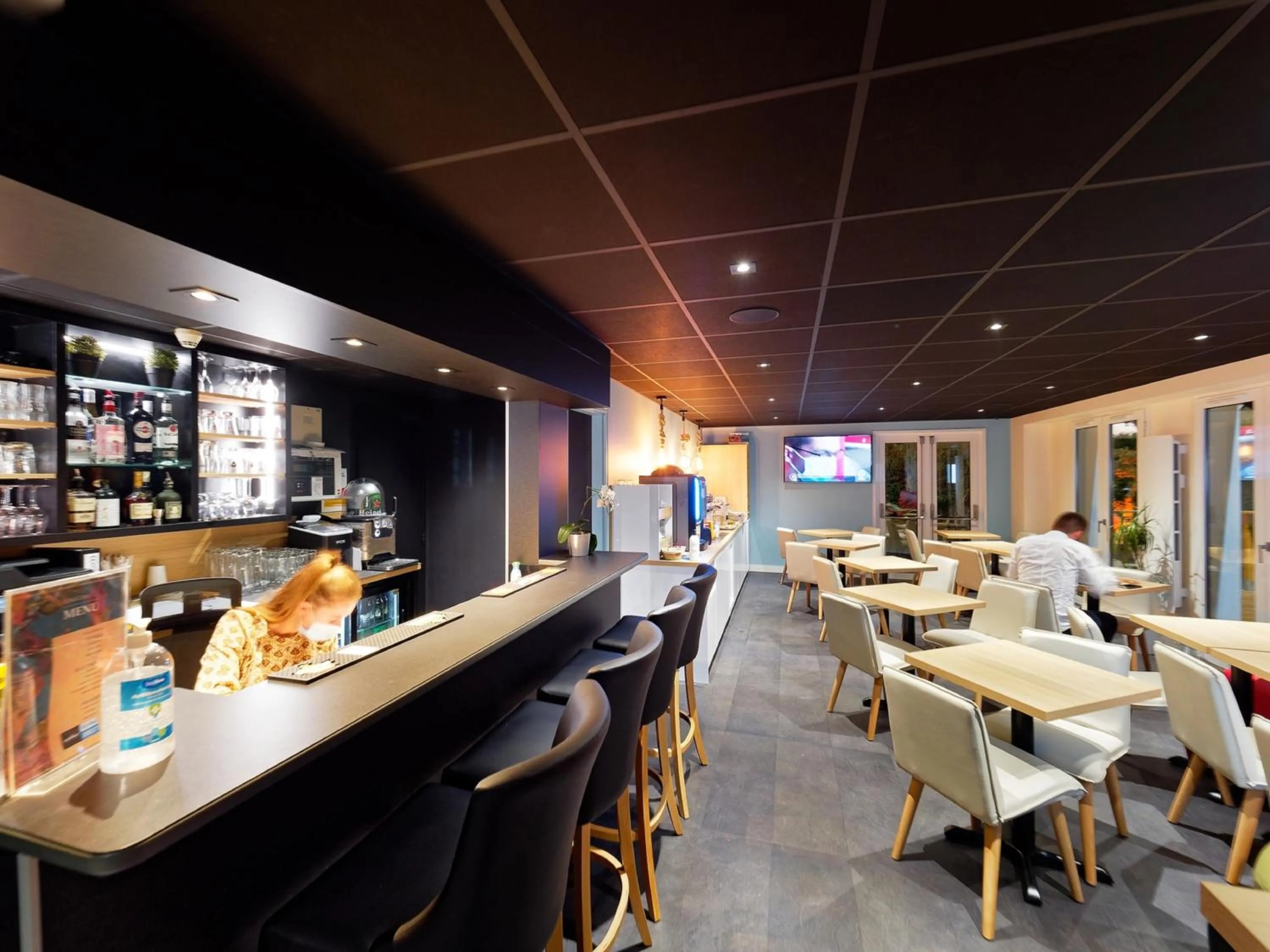 Communal lounge/ TV room in Kyriad DIRECT Saint Brieuc - Parc des Expositions