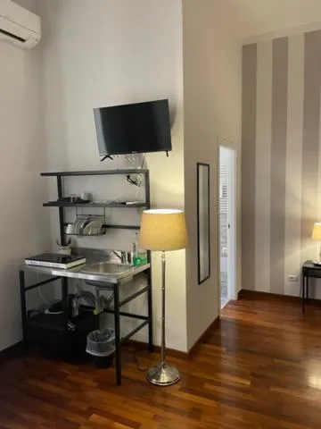 Kitchen or kitchenette in Piazza Cavour Suite